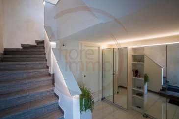 Visite virtuelle : https://app.immoviewer.com/portal/tour/2425199

Nous avons le plaisir de vous proposer à la vente une accueillante maison qui vous séduira par son aménagement fonctionnel, parfaite pour une famille avec enfants, à proximité du Château de Munsbach et des toutes commodités (écoles, commerces, transport public, accès autoroutier). A moins de 10 minutes du quartier d'affaires du Kirchberg et des institutions européennes.
D’une surface totale de 270m2, elle comprend 165m2 de superficies de vie, différentes terrasses et un spacieux grenier complètement aménagé.
Rénovée complètement en 2018-19 elle se compose d'espaces de vie lumineuses et spacieuses, en particulier: 
- hall d’entrée;
- buanderie;
- garage 2 voitures plus 2 parking extérieurs;
- une grande cuisine avec équipement moderne ouverte sur 
  un large living abrité dans une véranda et juxtaposant 
  la terrasse (+/- 54m2) et le jardin ;
- 2 caves et cave à vin;
- 4 chambres à coucher (dont 1 utilisée comme cuisine 
  complémentaire à l'étage);
- 1 salle de bain avec baignoire balnéo design pour 2 
  personnes (traitement balnéo, airflow et 
  chromothérapie);
- 3 salles de douche;
- une grande terrasse au premier l'étage(+/-24m2);
- grenier aménagé avec placards encastrés et salle de 
  douche supplémentaire.

Finitions et prestations de standing (vidéophone, alarme, placards encastrés sur mesure, luminaires d’ambiance, 
LED dimmables dans toute la maison, luminaires d’ambiance LED RGB dans la véranda et living
volets électriques, triple vitrage Schüco, moustiquaires, adoucisseur d’eau, chauffage au sol, etc.).

Possibilité de reprise des meubles et de convertir la maison en deux appartements.

Pour plus de renseignements, veuillez contacter l'agence.<br />Virtueller Besuch : https://app.immoviewer.com/portal/tour/2425199

wir freuen uns, Ihnen ein  charmantes Reihenhaus zum Kauf anzubieten, die Sie mit ihrer funktionalen Aufteilung verführen wird, ideal für eine Familie mit Kindern, in der Nähe des Schlosses von Munsbach und aller Annehmlichkeiten (Schulen, Geschäfte, öffentliche Verkehrsmittel, Autobahnanschluss).

Auf einer Gesamtfläche von 270 m2 befinden sich 165m2 Wohnfläche, verschiedene Terrassen und ein geräumiges Dachgeschoss, das komplett ausgebaut wurde.
Es wurde 2018-19 komplett renoviert und besteht aus hellen und geräumigen Wohnbereichen, insbesondere: 

- Eingangshalle;
- Waschküche;
- Garage für 2 Autos plus 2 Außenstellplätze;
- eine große offene Küche mit moderner Ausstattung am 
  Wohnzimmer und Veranda, die zur Terrasse führt und 
  die Terrasse und den großen Garten (+/-54m2) ;
- 2 Keller und Weinkeller;
- 4 Schlafzimmer (wovon 1 als zusätzliche Küche im ersten 
  Stock genutzt wird);
- 1 Badezimmer mit Designer-Whirlpool-Badewanne für 2 
  Personen (Whirlpool-Behandlung,Luftstrom und 
  Farbtherapie);
- 3 Duschräume;
- eine große Terrasse im ersten Stock (+/-24m2);
- Dachboden mit Einbauschränken und Duschraum.

Hochwertige Ausstattung (Video-Gegensprechanlage, Alarmanlage, maßgefertigte Einbauschränke, Beleuchtungskörper, elektrische Rollläden, Schüco-Dreifachverglasung, Moskitonetze, Wasserenthärter, Fußbodenheizung, usw.).

Es besteht die Möglichkeit, die Möbel zu übernehmen und das Haus in zwei Wohnungen umzuwandeln.

Für weitere Informationen wenden Sie sich bitte an die Agentur.<br />Virtual visit : https://app.immoviewer.com/portal/tour/2425199

We are pleased to offer for sale a semi-detached house which will seduce you with its functional layout, perfect for a family with children. Close to the Château de Munsbach, all amenities (schools, shops, public transport, motorway access) and only 10 minutes away from the Kirchberg business district and the European institutions.
 
With a total surface area of 270m2, it includes 165m2 of living space, various terraces and a spacious attic.
Completely renovated in 2018-19, it is composed of bright and spacious living areas, in particular: 
 
- entrance hall;
- laundry room;
- garage for 2 cars plus 2 outdoor parking spaces;
- a large open kitchen with modern equipment, a spacious 
  living room in a veranda facing the terrace (+/-54sqm)
  and the large garden;
- 2 cellars and wine cellar;
- 4 bedrooms (1 of which is used as an additional kitchen 
   on the first floor);
- 1 bathroom with designer whirlpool bathtub for 2 persons 
  (whirlpool treatment, airflow and chromotherapy);
- 2 shower rooms;
- a large terrace on the first floor (+/-24sqm);
- an attic with built-in cupboards and an extra shower 
  room.
 
High quality finishings and facilities (video intercom, alarm, custom built in cupboards, dimmable LED light, RGB LED light fittings in the veranda and living room, electric shutters, Schüco triple glazing, mosquito nets, water softener, underfloor heating, etc.).
 
Possibility of taking over the furniture and converting the house into two flats.

For more information, please contact the agency.