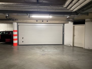 DESCRIPTION D'UN GARAGE POUR 2 VOITURES DANS LE SOUS-SOL D'UN IMMEUBLE AU CENTRE DE STEINSEL/MULLENDORF.