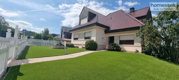 Bâtie sur un agréable terrain de 8a 18, cette volumineuse maison libre 4 côtés apportera pleine satisfaction aux familles nombreuses et amateurs d\'espace et de tranquillité. D\'une superficie totale de 468m², elle se compose comme suit :<br>Au rez-de-chaussée : <br>-Lumineux salon-salle à manger de 52m² avec accès à une loggia de 12.83m²<br>-Loggia bien orientée (accès au jardin par un escalier métallique)<br>-Hall d\'entrée<br>-Cuisine séparée de 16.32m²<br>-Bureau de 14.99m²<br>-2 chambres de 11.52m² et 26.09m²<br>-Salle de bains de 6.46m²<br>-WC séparés<br>A l\'étage:<br>-WC séparés<br>-Chambre parentale de 52.01m² avec sa salle de bain privative de 14.60m² (mansardes) et une loggia de 6m² permettant de profiter de la vue panoramique<br>-Chambre de 45.75m² avec accès à une terrasse de 15.65m².<br>A noter : point d\'eau et kitchenette dans la 2e chambre, possibilité de créer aisément 2 chambres séparées de 20m² chacune. Toutes les pièces de vie sont climatisées.<br>Au sous-sol: aménagé complètement sous toute la surface on y retrouve un double garage en enfilade, une salle TV de 25.95m², cave à vin, buanderie, salle de sport de 36.24m² avec coin douche, WC et sauna. Accès à une véranda de 24.27m² avec cuisine d\'été et barbecue/feu ouvert.<br>A l\'extérieur, agréable pergola avec bassins pour poissons, barbecue et en bas de l\'allée latérale 2 garages box de 15.59m² chacun. Maison saine et agréable, construction de qualité. <br>Système d\'alarme et domotique. Adoucisseur,  climatisation, prise de recharge pour voiture électrique.