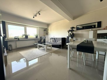 BYimmobilier vous propose en exclusivité cet agréable appartement idéalement situé à Belvaux.

D'une disposition fonctionnelle, il se compose comme suit :

Hall d'entrée
Séjour lumineux
Cuisine indépendante
Deux chambres à coucher, chacune avec accès au balcon
Salle de douche avec WC suspendu

L'appartement bénéficie également d'une cave privative d'environ 10 m², offrant un espace de rangement supplémentaire.

Un bien idéal pour un premier achat ou un investissement, à découvrir sans tarder.

Pour plus d'informations ou pour organiser une visite, contactez nous.