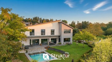 .  +++ EN EXCLUSIVITÉ +++ Livret et Visite virtuelle sur demande +++
  
 VILLA SUR  LES HAUTEURS DE THIONVILLE GUENTRANGE
  
 Laissez-vous séduire par cette superbe maison familiale de 280 m2 habitables complétée par 255 m2 de surface utile en annexe, construite en 2012 sur un terrain de 15 ares clos et arboré. Ici chaque espace a été pensé pour offrir confort lumière et modernité dans un environnement préservé avec une vue imprenable sur Thionville et ses environs
  
 Un cadre de vie rare et privilégié : Nichée dans un secteur calme cette maison offre un parfait équilibre entre tranquillité et proximité de toutes les commodités : commerces, écoles, lycées, centre-ville et accès rapide aux autoroutes A31/A4.
  
 De généreux volumes baignés de lumière : Dès l'entrée vous découvrirez une pièce de vie spacieuse et lumineuse, le salon, la salle à manger et la cuisine équipée avec îlot central s'ouvrent sur une terrasse plein sud de 100 m2, prolongée par le jardin et la piscine.  Une arrière-cuisine, un salon TV, un bureau, un vestiaire et un wc avec lave-main complètent ce niveau.
  
  A l'extérieur le jardin clos et arboré invite à la détente, tout comme la piscine chauffée (2020) équipée d'un système de nage à contre-courant et d'un rideau de sécurité intégré.
  
 Un espace nuit idéal pour toute la famille : A l'étage la suite parentale offre une chambre, un dressing et une salle de bain privative avec double vasque, douche, baignoire et wc. Trois autres chambres avec dressing aménagé bénéficient d'un accès direct au balcon de 15 m2 offrant une vue panoramique sur la vallée. Deux salles d'eau avec douche et wc, ainsi qu' une buanderie qui complètent l'étage.
  
 Le grenier de 80 m2 entièrement aménageable offre un potentiel supplémentaire selon vos projets.
    
 Le sous-sol dispose d'une pièce aménagée en salle de sport, de plusieurs espaces de stockage, d'un atelier, d'une cave à vin sur terre battue et d'un espace technique regroupant la VMC, le système de chauffage et la filtration de la piscine.
  
   Un garage double motorisé pour deux véhicules et une cour pouvant accueillir jusqu'à six voitures.
   
  
 Cette villa pensée pour le confort et performance énergétique n'attend que vous pour écrire une nouvelle histoire
  
  
 Caractéristiques : 
 - DPE B/A
 - Consommation énergétique réelle 2024 : +/-2600 EUR (Electricité +/-2100 EUR et +/- 500 EUR de Bois de chauffage)
  - Isolation par l'extérieur 14cm, Poêle à bois, Puit Canadien, VMC double flux, Chauffage électrique par le sol, Fenêtres oscillo-battantes bois/alu, triple vitrage à isolation renforcée
 - Vitrage anti effraction au rez-de-chaussée
 - Volets brise soleil orientable motorisés 
 - Toiture en Zinc (2021) 
 - Cuisine équipée avec ilot   
 - Salle de bains et salle d'eau meublées avec radiateur porte-serviettes 
 - Piscine (2020) avec nage à contre-courant et chauffée par pompe à chaleur, filtration à sable 
 - Dressings aménagés avec penderies et étagères 
 - Suite parentale avec double vasque, baignoire, douche, radiateur porte serviette et dressing 
 - Les possibilités d'aménagement : Création d'une suite parentale au rez-de-chaussée, aménagement partiel du sous-sol en studio
   
 DPE B/A :  Estimation des coûts annuels : entre 1 960 EUR et 2 700 EUR par an -  Prix moyens des énergies indexés sur les années 2021, 2022, 2023
  Honoraires charge acquéreur inclus dans le prix:(2,88 %)