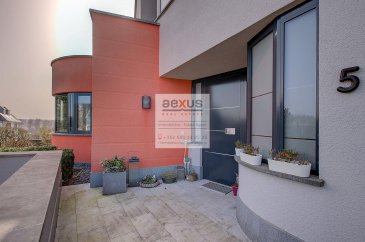 Blaschette (Lorentzweiler), 5, im Herbstfeld Maison unifamilale isolée 5 chambres à coucher, 3 salles de bains, Garage 2 voitures 2 emplacements extérieurs 258 m2 net habitable, 385 m2 brut.

Belle et grande maison unifamiliale lumineuse et atypique, bien agencée, rénovée partiellement, organisée comme suit :

Rez de chaussée : Garage 2 voitures, cave, cave à vin, chaufferie (chauffage à pellets et collecteurs solaires), buanderie, cave pour jardin et matériel de piscine, accès jardin sur le côté de l'immeuble.

Rez de jardin, Hall d'entrée, chambre avec salle de douche et WC et pièce séparée pour kitchenette, WC séparé, Cuisine, débarras équipé, salle à manger et living avec feu ouvert (hauteur sous plafond de 7,7m), petit salon, accès au jardin direct par deux terrasses, une au sud, et une à l'ouest (avec marquise électrique), grand jardin avec petite piscine, de belles plantations bien entretenues. Accès au jardin caché de la rue entre les buissons. 

Premier étage : petit espace bureau en mezzanine sur le living, 2 chambres à coucher avec mezzanine, salle de douche, WC séparé, grande chambre avec salle de bain, baignoire, douche et WC attenant, chambre ou bureau avec terrasse .

Cette maison est située dans un lotissement récent dans une rue sans issue, à l'écart de la route principale, avec des vues à couper le souffle, avec beaucoup de plantations exceptionnelles, garantissant une vie privée dans un cadre naturel.

Une aire de jeux se trouve en face de la maison. Les écoles, crèches,  et maisons-relais se trouvent à 2,5 km se trouvent à Lorentzweiler. La gare CFL de Lorentzweiler est à 3 km. L'accès autoroutier vers l'A7 est à 4 km. Les supermarchés se trouvent à Junglinster et Walferdange.

La maison a subi une rénovation importante en 2019, les salles de bains nécessitent cependant un rafraîchissement.

Cat. énergétique : A/F

Pour toutes informations :  Tel :  352 277 50 401
Vente par AEXUS REAL ESTATE. Découvrez tous nos biens sur www.aexus.lu
Aexus real estate est membre de la Chambre Immobilière du Grand-Duché de Luxembourg (seul organisme accrédité par l'état pour la certification des agents immobiliers) et travaillons dans le respect de leur code de déontologie, gage de qualité des services et de sériosité.
Si vous souhaitez vendre ou louer votre bien, profitez-vous aussi de notre expérience et connaissance du marché à Luxembourg. Estimation rapide, gratuite et réaliste.


Blaschette (Lorentzweiler), 5, im Herbstfeld Freistehendes Einfamilienhaus 5 Schlafzimmer, 3 Bäder, 2 PKW-Garage 2 Aussenplätze 258 m2 Netto-Wohnfläche, 385 m2 Brutto.

Schönes, grosses, helles, untypisches Einfamilienhaus, gut eingerichtet, teilweise renoviert, wie folgt aufgeteilt:

Erdgeschoss: Garage für 2 Autos, Keller, Weinkeller, Heizungsraum (Pelletheizung und Sonnenkollektoren), Waschküche, Keller für Garten- und Schwimmbadgeräte, Gartenzugang an der Seite des Gebäudes.

Gartenebene: Eingangshalle, Schlafzimmer mit Duschbad und WC und separatem Raum für Kochnische, separates WC, Küche, eingerichteter Abstellraum, Esszimmer und Wohnzimmer mit offenem Kamin (Deckenhöhe 7,7 m), kleines Wohnzimmer, direkter Zugang zum Garten über zwei Terrassen, eine nach Süden und eine nach Westen (mit elektrischer Markise), großer Garten mit kleinem Swimmingpool, schöne und gepflegte Bepflanzung. Zugang zum Garten versteckt von der Straße zwischen den Büschen. 

Obergeschoss: kleiner Büroraum auf der Mezzanine des Wohnzimmers, 2 Schlafzimmer mit Mezzanine, Duschbad, separates WC, großes Schlafzimmer mit Bad, Badewanne, Dusche und WC angeschlossen, Schlafzimmer oder Büro mit Terrasse .

Dieses Haus befindet sich in einer neueren Wohnsiedlung in einer Sackgasse, abseits der Hauptstraße, mit atemberaubender Aussicht, mit vielen außergewöhnlichen Plantagen, die Privatsphäre in einer natürlichen Umgebung garantieren.

Vor dem Haus befindet sich ein Spielplatz. Schulen, Kindergärten, Kindertagesstätten und Ferienhäuser sind in Lorentzweiler 2,5 km entfernt. Der CFL-Bahnhof in Lorentzweiler ist 3 km entfernt. Der Autobahnanschluss an die A7 ist 4 km entfernt. Supermärkte finden Sie in Junglinster und Walferdange.

Das Haus wurde 2019 einer größeren Renovierung unterzogen, allerdings müssten die Bäder aufgefrischt werden.

Energieklasse: A/F
Für weitere Informationen: Tel:  352 277 50 401
Verkauf durch AEXUS REAL ESTATE. Entdecken Sie alle unsere Immobilien auf www.aexus.lu
Aexus Real Estate ist Mitglied der Chambre Immobilière du Grand-Duché de Luxembourg (die einzige vom Staat akkreditierte Stelle für die Zertifizierung von Immobilienmaklern) und arbeitet nach deren Ethikkodex, eine Garantie für die Qualität der Dienstleistung und Seriosität.
Wenn Sie Ihre Immobilie verkaufen oder vermieten möchten, profitieren Sie von unserer Erfahrung und unserer Kenntnis des luxemburgischen Marktes. Schnelle, freie und realistische Einschätzung.


Blaschette (Lorentzweiler), 5, im Herbstfeld Isolated single family house 5 bedrooms, 3 bathrooms, 2 car garage 2 outdoor spaces 258 m2 net living space, 385 m2 gross.

Beautiful and large, bright and atypical single-family house, well arranged, partially renovated, organised as follows :

Ground floor: 2 car garage, cellar, wine cellar, boiler room (pellet heating and solar collectors), laundry room, cellar for garden and swimming pool equipment, garden access on the side of the building.

Garden level: Entrance hall, bedroom with shower room and WC and separate room for kitchenette, separate WC, kitchen, equipped storage room, dining room and living room with open fire (ceiling height 7.7m), small lounge, direct access to the garden via two terraces, one to the south and one to the west (with electric awning), large garden with small swimming pool, beautiful and well maintained plantations. Access to the garden hidden from the street between the bushes. 

First floor: small office space on the living room mezzanine, 2 bedrooms with mezzanine, shower room, separate WC, large bedroom with en suite bathroom, bath, shower and WC, bedroom or office with terrace .

This house is situated in a recent housing estate in a dead-end street, away from the main road, with breathtaking views, with many exceptional plantations, guaranteeing privacy in a natural setting.

There is a playground in front of the house. Schools, nurseries, day-care centres and holiday homes are 2.5 km away in Lorentzweiler. The CFL railway station in Lorentzweiler is 3 km away. The motorway access to the A7 is 4 km away. Supermarkets can be found in Junglinster and Walferdange.

The house underwent a major renovation in 2019, however the bathrooms need to be refreshed.

Energy category: A/F
For further information: Tel:  352 277 50 401
Sale by AEXUS REAL ESTATE. Discover all our properties on www.aexus.lu
Aexus real estate is a member of the Chambre Immobilière du Grand-Duché de Luxembourg (the only body accredited by the state for the certification of estate agents) and works in accordance with their code of ethics, a guarantee of quality of service and seriousness.
If you wish to sell or rent your property, take advantage of our experience and knowledge of the market in Luxembourg. Fast, free and realistic estimation.

