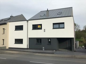 NOUVEAUTÉ - Appartement-Duplex très lumineux d\'une surface de 187.90 m2 et balcon de 7.3 m2 à Dahlem commune de Garnich, en cours de finition, dans une résidence de haut standing est se compose d\'un ensemble de 2 unités :  <br><br>L\'appartement se compose comme suit : <br><br>1er Etage 132.30 m2: <br>- Entrée séparée<br>- Hall d\'entrée <br>- 1 WC Séparée<br>- Grande living (45,50m2) avec accès sur le balcon<br>- Salle à manger et cuisine ouverte sur living et le balcon<br>- 1 Salle de douche <br>- 1 chambre de 12,4m2<br>- 1 suite parentale de 18,40m2<br><br>2ème étage (comble) 55.60 m2: :<br>- 1 Salle de bain <br>- 1 salle de fitness (salle de jeux) de 55.60 m2 ou possibilité de faire 3ème ou 4ème chambre<br><br>Extérieur : <br>- Grand Garage BOX 1 voiture + 1 emplacement extérieur <br>- Jardin privatif de +/- 3,5 ares <br><br>En cour de construction !<br>Construction de haute qualité incluant triple vitrage avec volet électrique, chauffage au sol, VMC Double Flux (Ventilation), Panneaux solaire thermique, Solaire photovoltaïque...<br><br>Les travaux de finition tel que peintures et revêtement sol et mural sont à charge de l\'acquéreur.<br><br>Un garage, jardin ainsi qu\'une cave sont inclus dans le prix.<br><br>• Classe d\'isolation thermique A<br>• Classe de performance environnementale A<br><br>Description de la situation :  La maison se situe à proximité de toutes les commodités.<br><br>Pour tout complément d‘information, n\'hésitez pas à nous contactez par téléphone au <br>28 77 88 22, Nous sommes également disponibles pour organiser les visites le samedi !  <br><br>Nous sommes, en permanence, à la recherche de nouveaux biens à vendre (des appartements, des maisons et des terrains à bâtir) pour nos clients acquéreurs. N‘hésitez pas à nous contacter si vous souhaitez vendre ou échanger votre bien, nous vous ferons une estimation gratuitement. <br />Ref agence :55