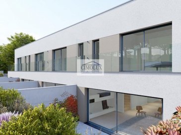 L\'agence CIMOLUX vous propose une future nouvelle construction de 2 maisons bi-familiales avec 2 duplex.<br><br>La résidence dispose:<br><br>-2 duplex avec une superficie de +/-132,46m2, un hall d\'entrée, une cuisine, un salon/salle à manger avec sortie sur la terrasse (+/-24m2), un jardin, un WC séparé, 4 chambres dont 2 avec un balcon (+/-6m2), 2 salles de bains, 2 emplacements intérieurs, une cave et une buanderie  proche de toutes le  commodites kirchberg en 7 min. <br><br>Le prix des 3 duplex est de 1.159.178€ - 1.169.678€<br>(frais d\'agence compris 3% + Tva 17 % à la charge du vendeur)<br><br>-le 4ème duplex avec une superficie de +/-131,61m2, un hall d\'entrée, une cuisine, un salon/salle à manger avec sortie sur la terrasse (+/-24m2), un jardin, un WC séparé, 3 chambres dont 2 avec un balcon (+/-6m2), 2 salles de bains, 2 emplacements intérieurs, une cave et une buanderie commune. <br><br>Le prix du 4ème duplex est de 1.150.000€.<br>(frais d\'agence compris 3% + Tva 17 % à la charge du vendeur)<br><br>Pour plus d\'informations n\'hésitez pas à nous contacter.<br><br>Pour l\'obtention de votre crédit, notre relation avec nos partenaires financiers vous permettront d\'avoir les meilleures conditions.