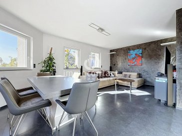 L'agence immobilière Immo-Contact vous propose ce superbe appartement de +/- 150m² de surface totale  situé à Dudelange.

Situé dans l'une des rues les plus calme de Dudelange, cet appartement offre de beaux volumes et bénéficie d'une belle luminosité dans le séjour grâce à son exposition Sud.

À proximité immédiate des crèches, commerces, restaurants, transports en commun, gare de Dudelange et principaux axes routiers, et  il offre un cadre de vie aussi pratique que confortable.

Ce bien représente une excellente opportunité, aussi bien pour une résidence principale que pour un investissement.

L'appartement, avec grenier aménagé, se compose comme suit :

- Hall d'entrée
- Séjour comprenant un espace salon et une salle à manger
- Cuisine équipée ouverte sur la pièce de vie
- Chambre à coucher avec suite parentale, comprenant douche et WC
- WC séparé

A l'étage:
- Chambre à coucher
- Pièce pouvant être utilisée comme bureau, dressing ou chambre d'enfant
- Salle de bain comprenant baignoire, WC et fenêtre

Une place de parking intérieure et une cave avec emplacement machine à laver viennent compléter ce bien.

À savoir :
- Disponibilité à convenir
- Facade rénovée en 2021

Certaines photos de cette annonce présentent un home staging virtuel (aménagement généré par IA) afin d'illustrer le potentiel des pièces. Le mobilier et les éléments de décoration ne sont pas inclus dans la vente.

Visites possibles en semaine et le samedi.

Pour toute information, contactez-moi au +352 621 794 938.
Estimation gratuite de votre bien sous 48h : +352 26 311 992 ou info@immocontact.lu

 ---------- 
The estate agency Immo-Contact is pleased to present this superb flat with a total floor area of approximately 150m², situated in Dudelange.

Situated on one of Dudelange's quietest streets, this flat offers spacious rooms and enjoys plenty of natural light in the living room thanks to its south-facing aspect.

In the immediate vicinity of nurseries, shops, restaurants, public transport, Dudelange station and major roads, it offers a lifestyle that is both convenient and comfortable.

This property represents an excellent opportunity, whether as a main residence or an investment.

The flat, which includes a converted attic, is laid out as follows:

- Entrance hall
- Living room comprising a lounge area and a dining area
- Fitted kitchen opening onto the living area
- Bedroom with en-suite bathroom, comprising a shower and toilet
- Separate toilet

Upstairs:
- Bedroom
- Room suitable for use as a study, walk-in wardrobe or child's bedroom
- Bathroom with bath, toilet and window

An indoor parking space and a cellar with space for a washing machine complete this property.

Please note:
- Availability to be agreed
- Façade renovated in 2021

Some of the photos in this advert feature virtual home staging (AI-generated interior design) to illustrate the potential of the rooms. Furniture and decorative items are not included in the sale.

Viewings available on weekdays and Saturdays.

For further information, please contact me on +352 621 794 938.
Free valuation of your property within 48 hours: +352 26 311 992 or info@immocontact.lu