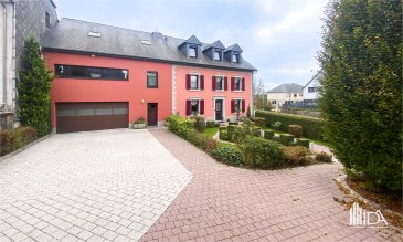 Découvrez cette magnifique maison de caractère, située dans le charmant village pittoresque de Boulaide, parfaite pour les amoureux de la nature et de l'authenticité. 

Avec ses espaces généreux et son charme intemporel, cette demeure 3 façades jumelée par le garage, allie harmonieusement confort et cachet ancien.

Construite dans les années 1900 sur plusieurs niveaux ayant été rénovée, la propriété dispose d'une surface habitable de +/- 220m² (surface totale +/- 440 m²) implantée sur un terrain de 6,20 ares. 

La maison se compose de:
- Spacieux hall d'entrée
- Belle cuisine équipée avec accès à une arrière cuisine 
- Grand séjour / salle à manger
- 3 grandes chambres à coucher 
- Une salle de bains avec baignoire balnéo, douche, WC et lavabo
- Un WC séparé et une buanderie
- Grenier aménageable avec possibilité d'y faire 2 chambres supplémentaires, salle de loisirs ou autre.

L'annexe offre la possibilité d'être transformée en espace de vie supplémentaire, en atelier ou en bureau, ce qui est parfait pour combiner vie personnelle et professionnelle.

Au sous-sol 2 belles et spacieuses caves à vins voûtées.

Extérieur :
- Beau jardin joliment arboré à l'arrière de la maison
- Une terrasse ensoleillée idéal pour des moments de détente
- Devant la maison un bel espace vert joliment arboré donnant du cachet à la demeure.

Points forts :
- Charme authentique, architecture traditionnelle et matériaux noble (portes en chêne)
- Cadre idyllique, situé dans un quartier paisible à proximité des sentiers de randonnée et de la nature

Informations complémentaires :
- Chauffage mazout (radiateurs)
- Garage spacieux pouvant accueillir 3 voitures 
- Plusieurs emplacements extérieurs devant la maison
- Volets manuels avec possibilité d'installation électrique
- Châssis PVC et fenêtres double vitrage
- Toiture neuve et façade rénovée
- Feu ouvert (cheminée) dans la salle à manger et arrière cuisine

Parfait équilibre entre authenticité et espace, cette maison de caractère offre un charme unique tout en harmonie et un fort potentiel certain.

Un coup de cœur pour cette belle propriété ? Ne manquez pas l'opportunité d'acquérir cette maison exceptionnelle, où le caractère ancien se marie parfaitement avec confort de vie.

Pour plus d'informations ou pour visiter cette propriété, contactez-nous au +352 23 62 90 20 ou sur immo@immoaida.lu  
Consultez nos biens sur www.immoaida.lu