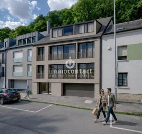 Nouvelle Construction Neudorf.

Immocontact vous propose à la vente un magnifique appartement de ±100m² de surface habitable dans une résidence de 3 unités située à Luxembourg-Neudorf

Ce bien offre un cadre de vie confortable et lumineux. Il dispose d’un grand espace de vie, 2 chambres à coucher et une terrasse de 10m².

L’appartement est situé au dernier étage et bénéficie d’un accès direct par ascenseur privatif.

Composition du bien :

- Hall d'entrée
- Salon / salle à manger 
- Emplacement prévu pour une cuisine ouverte
- 2 chambres à coucher de +/−15m² avec salle bain privatif pour chaque chambre
- WC séparé
- Cave

Annexes et équipements :

- Buanderie commune
- Local vélos
- Emplacement de parking intérieur disponible à partir de 59.566,50€ TVA 3%.

Situation et commodités :

L’appartement est idéalement situé, il se trouve à moins 5 minutes des écoles, des crèches et des arrêts de bus.

Le prix affiché comprend la TVA réduite à 3 %, sous réserve d’acceptation par l’Administration de l’Enregistrement et des Domaines.

La résidence répond aux dernières normes énergétiques et offre des prestations modernes et de qualité.

Pour plus de renseignements ou pour recevoir la documentation, contactez-nous au +352 621 758 643 ou par email à anastasia.feron@immocontact.lu.

 ---------- 
New Build in Neudorf.

Immocontact is pleased to offer for sale a magnificent flat with approximately 100m² of living space in a three-unit residence located in Luxembourg-Neudorf.

This property offers a comfortable and bright living environment. It features a spacious living area, two bedrooms and a 10m² terrace.

The flat is situated on the top floor and benefits from direct access via a private lift.

Layout of the property:

- Entrance hall
- Living/dining room
- Space provided for an open-plan kitchen
- 2 bedrooms of approximately 15m² each with en-suite bathrooms
- Separate toilet
- Cellar

Amenities and facilities:

- Shared laundry room
- Bicycle storage
- Indoor parking space available from €59,566.50 (3% VAT).

Location and amenities:

The flat is ideally situated, less than 5 minutes from schools, nurseries and bus stops.

The price shown includes VAT at the reduced rate of 3%, subject to approval by the Registration and Domains Administration.

The residence meets the latest energy standards and offers modern, high-quality facilities.

For further information or to receive documentation, please contact us on +352 621 758 643 or by email at anastasia.feron@immocontact.lu.