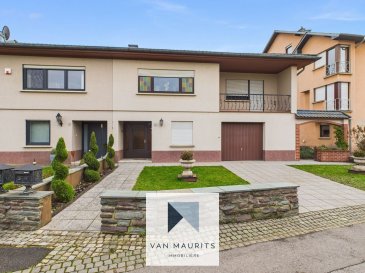 Située à Grevenmacher, cette maison jumelée construite en 1974, se trouvant dans un village calme et résidentiel, bénéficie d'une surface habitable de ± 120 m² érigée sur un terrain de 2.90 ares avec une orientation sud-est, garantissant une belle luminosité tout au long de la journée. A proximité des commerces, écoles et transports, elle est disponible immédiatement. Cette propriété, bien entretenue mais nécessitant un rafraîchissement, offre un fort potentiel d'aménagement et se présente comme suit :

Au rez-de-chaussée, un hall d'entrée de ± 6 m² dessert une chambre / bureau de ± 11 m², un WC séparé de ± 2 m², un couloir de ± 3 m², un garage de ± 50 m² avec coin buanderie intégré, une cave de ± 12 m², un atelier de ± 12 m² et une chaufferie de ± 4 m² équipée d'une chaudière au mazout Viessmann.

Le premier étage accueille la partie principale de vie.
On y trouve un séjour lumineux de ± 31 m² avec un salon / chambre attenant de ± 15 m² avec accès au balcon de ± 6 m² ainsi qu'une cuisine de ± 8 m², entièrement équipée et aménagée DAN Küchen.
Cet étage compte également deux chambres de ± 12 et 17 m², une salle de douche de ± 6 m² (avec lavabo, douche et WC), ainsi qu'un palier de ± 4 m².

Le grenier isolé de ± 42 m², situé sous un toit double en tuiles, offre un bel espace de stockage ou la possibilité d'un aménagement complémentaire selon les besoins.

À l'extérieur, une place de stationnement devant le garage complète le bien.

Détails et finitions :
- Sol : carrelage, granit/marbre et revêtement laminé, combinant robustesse et esthétique.
- Revêtement mural : murs peints et partiellement recouverts de papier-peint.
- Fenêtres : châssis en bois avec double vitrage, assurant une bonne isolation thermique.
- Volets : volets manuels installés sur l'ensemble des ouvertures.
- Toiture : tuiles en bon état, grenier isolé.
- Chauffage : chaudière au mazout Viessmann, avec diffusion de la chaleur par radiateurs.
- Cuisine : cuisine équipée et aménagée DAN Küchen, comprenant four, micro-ondes, frigo, hotte aspirante, lave-vaisselle, meubles de rangement, plan de travail et table intégrée.

Environnement et commodités :
La maison bénéficie d'une situation privilégiée dans un environnement villageois calme tout en restant proche des infrastructures essentielles : commerces, restaurants, écoles, clubs sportifs et centres de loisirs. Les arrêts de bus, la gare et les connexions autoroutières permettent des déplacements aisés vers les villes environnantes. À proximité, vous trouverez également des parcs de jeux, des pistes cyclables et des chemins de randonnée, offrant un cadre de vie agréable et convivial.

Contact: 
Juha Ahonen
+352 661 249 476
juha@vanmaurits.lu


Located in Grevenmacher, this semi-detached house built in 1974 is situated in a quiet, residential village and offers a living area of ± 120 m² on a 2.90 ares plot. With its south-east orientation, the property enjoys beautiful natural light throughout the day. Close to shops, schools and public transport, it is available immediately. 

Well maintained but in need of refreshing, this property offers great potential and is laid out as follows:

On the ground floor, an entrance hall of ± 6 m² leads to a bedroom/office of ± 11 m², a separate toilet of ± 2 m², a corridor of ± 3 m², a garage of ± 50 m² with an integrated laundry area, a cellar of ± 12 m², a workshop of ± 12 m² and a boiler room of ± 4 m² equipped with a Viessmann oil-fired boiler.

The first floor hosts the main living area.
It includes a bright living room of ± 31 m² with an adjoining lounge/bedroom of ± 15 m² providing access to a ± 6 m² balcony, as well as a fully fitted and equipped DAN Küchen kitchen of ± 8 m².
This floor also features two bedrooms of ± 12 and 17 m², a shower room of ± 6 m² (with washbasin, shower and toilet), and a landing of ± 4 m².

The insulated attic of ± 42 m², located under a double tiled roof, offers ample storage space or the possibility of additional conversion depending on your needs.
Outside, a parking space in front of the garage completes the property.

Details and finishes:
- Flooring: tiles, granite/marble and laminate, combining durability and aesthetics.
- Wall covering: painted walls, partly wallpapered.
- Windows: wooden frames with double glazing, ensuring good thermal insulation.
- Shutters: manual shutters installed on all openings.
- Roof: tiled roof in good condition, insulated attic.
- Heating: Viessmann oil-fired boiler with heat distribution via radiators.
- Kitchen: fully fitted and equipped DAN Küchen kitchen, including oven, microwave, fridge, extractor hood, dishwasher, storage cabinets, worktop and integrated table.

Environment and amenities:
The house enjoys a privileged location in a peaceful village setting while remaining close to essential facilities: shops, restaurants, schools, sports clubs and leisure centres. Bus stops, the train station and motorway connections provide easy access to nearby towns. You will also find playgrounds, cycle paths and hiking trails close by, offering a pleasant and friendly living environment.

Contact: 
Juha Ahonen
+352 661 249 476
juha@vanmaurits.lu