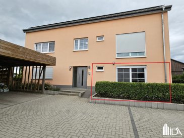 L'Immobilière de l'Attert vous propose en location cet agréable appartement situé dans le village de Wahl, commune de Groussbus-Wal.

L'appartement de +/- 74 m² situé au rdch se compose de:

- hall d'entrée 
- débarras avec connexion lave-linge
- beau séjour / salle à manger avec coin cuisine équipée, sortie sur terrasse
- 2 chambres à coucher 
- salle de douche, lavabo, wc et connexion lave-linge.

L'appartement dispose d'un emplacement de parking extérieur et d'un emplacement de parking carport.

Loyer : 1 500€  
Charges : 200€  
Caution : 2 mois de loyer  
Frais d'agence : 1 mois de loyer + TVA (partagé 50/50 entre locataire et bailleur)

Ce bien vous intéresse ! Merci de remplir le 