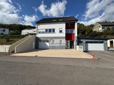 IMMO EXCELLENCE vous propose en exclusivité cette magnifique maison individuelle d'une surface habitable d'environ 168 m² et une surface utile d'environ 263 m², érigée sur un terrain de 6,20 ares, dans un environnement calme et verdoyant à Bollendorf.

Cette propriété séduit par ses espaces généreux, sa luminosité naturelle, ainsi que par ses vues imprenables et dégagées depuis le jardin et la terrasse.

La maison se compose comme suit : Une rez-de-chaussée vous trouvez : Un grand garage avec poêle et cuisine équipée (34,52 m²), deux chambres à coucher (12,45 m² et 11,04 m²), une salle de douche avec WC (5,30 m²), un hall d'entrée (12,77 m²), ainsi qu'un second garage comprenant les installations techniques, espace buanderie avec raccordements pour machine à laver et sèche-linge.

Au 1er étage vous trouvez  : Un hall (7,49 m²), un WC séparé (2,28 m²), une chambre à coucher (11,32 m²) avec accès direct vers le jardin, une cuisine moderne entièrement équipée et ouverte (7,90 m²) avec un spacieux double séjour lumineux (38,90 m²) et accès direct à la terrasse et au jardin.

Au 2ème étage vous trouvez : Un hall (10,33 m²), une salle de bains avec douche (8,78 m²), ainsi que trois chambres à coucher (11,42 m² ? 12,36 m² ? 15,58 m² ) dont une avec dressing.

La maison dispose encore d'un grand grenier offrant un espace de rangement supplémentaire, de plusieurs terrasse dont une étant couverte, d'un jardin entièrement clôturé et aménagé, d'une marquise, d'un stockage en-dessous des escalier, ainsi que de cinq emplacements pour voitures.

La maison est idéalement située à Bollendorf, à 10 minutes du centre-ville d'Echternach, à 20 minutes de Diekirch et à 35 minutes du centre-ville de Luxembourg.

La maison se situe dans un environnement calme et paisible, offrant de vues dégagées et imprenables.

Objet de charme à voir absolument !



IMMO EXCELLENCE bietet Ihnen exklusiv, dieses wunderschöne, freistehende Einfamilienhaus mit einer Wohnfläche von ca. 168 m² und einer Nutzfläche von ca. 263 m²  auf einem 6,20 Ar großen Grundstück in einer ruhigen und grünen Wohngegend in Bollendorf.

Diese Immobilie besticht durch ihre großzügigen Räume, viel Tageslicht sowie durch einen unverbaubaren, traumhaften Ausblick von Garten und Terrasse.

Die Raumaufteilung setzt sich folgendermassen zusammen : Ein Erddgeschoss mit großer Garage ausgestattet mit einem Kaminofen und einer  Küche (34,52 m²), zwei Schlafzimmer (12,45 m² und 11,04 m²), einem Duschbad mit WC (5,30 m²), einem  Eingangsbereich / Flur (12,77 m²), sowie einer zweiten Garage mit Haustechnik, Waschmaschinen- und Trockneranschluss. 

Im ersten Obergeschoss befindet sich : Ein Flur (7,49 m²), ein separates WC (2,28 m²), ein Schlafzimmer (11,32 m²) mit direktem Zugang zum Garten, eine moderne, offene und voll ausgestattete Küche (7,90 m²) sowie einem großzügigen, hellen Wohn- und Essbereich (38,90 m²) mit direktem Zugang zur Terrasse und zum Garten.

Im 2ten  Obergeschoss bestindet sich : Ein  Flur (10,33 m²), ein 
Badezimmer mit Dusche (8,78 m²), sowie drei Schlafzimmer (11,42 m² ? 12,36 m² ? 15,58 m²), eines davon mit begehbarem Kleiderschrank.

Zusätzliche Ausstattung: Großzügiger Dachboden mit viel Stauraum, mehrere Terrassen, davon eine überdacht, komplett eingezäunter und angelegter Garten, eine Markise, ein Astellraum unter der Treppe, sowie fünf Außenstellplätze für Fahrzeuge

Die Immobilie befindet sich in Bollendorf, nur, 10 Minuten vom Stadtzentrum Echternach, 20 Minuten von Diekirch sowie 35 Minuten von Luxemburg-Stadt entfernt.

Weitere Pluspunkte: Ruhige und friedliche Lage, unverbaute und atemberaubende Ausblicke, gepflegtes Grundstück mit viel Privatsphäre.

Ein Objekt mit Charme ? ein Muss für jeden, der auf der Suche nach Qualität und Ruhe ist!



IMMO EXCELLENCE is proud to offer you exclusively, this beautiful detached single-family home, offering approximately 168 m² of living space and 263 m² of usable space, situated on a 6.20-are plot in a quiet and green residential area in Bollendorf.

The property impresses with its spacious layout, abundant natural light, and unobstructed, breathtaking views from both the garden and the terrace.

The Ground Floor of the house offers : A large garage with wood-burning stove and fully equipped kitchen (34.52 m²), two bedrooms (12.45 m² and 11.04 m²), a shower room with WC (5.30 m²), an Entrance hall / corridor (12.77 m²), and a second garage housing the technical installations, with connections for washing machine and dryer.

The first floor offers : A hallway (7.49 m²), a separate WC (2.28 m²), a bedroom (11.32 m²) with direct access to the garden, a modern, open-plan and fully equipped kitchen (7.90 m²), a spacious and bright living/dining area (38.90 m²) with direct access to the terrace and garden.

The second floor offes : A hallway (10.33 m²), a bathroom with shower (8.78 m²), three bedrooms (11.42 m² ? 12.36 m² ? 15.58 m²), one of which includes a walk-in wardrobe.

Other additional features: Large attic with ample storage space, multiple terraces, including one covered, fully fenced and landscaped garden, awning, storage space under the staircase, and five outdoor parking spaces.

This beautiful house is located in Bollendorf, only 10 minutes from Echternach city center, 20 minutes from Diekirch and 35 minutes from Luxembourg City.

 Further Advantages: Peaceful and quiet surroundings, unspoiled, panoramic views, well-maintained property offering complete privacy.

A charming property, a must-see for anyone seeking quality and tranquility!