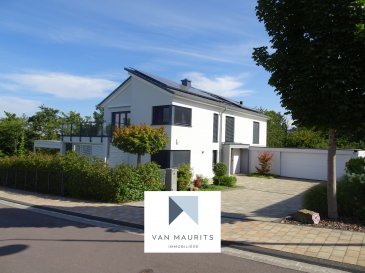Modern and Private Home in Wincheringen 

Located just across the Mosel River on the German side, this elegant and contemporary home in Wincheringen offers the perfect blend of comfort, privacy, and functionality.

Completed in September 2020, this spacious property features 229m2 of living space on a 1,192m2 plot, combining modern design with an exceptional setting: the most private location in a quiet cul-de-sac, with privacy on three sides and direct access to the forest. 

Ground Floor:
Upon entering, you are welcomed by a spacious entry hall (8m2) leading into a bright and open living area.
The open plan kitchen (17m2), dining area (22m2), and living room (24m2) create a seamless flow, ideal for modern living.
The kitchen, equipped with high-quality ORF wine cellar, features a granite countertop island that enhances both style and functionality. 

From the living area, you have direct access to two terraces (54m2 and 18m2), offering beautiful outdoor spaces for dining, entertaining, and relaxation. 

Additional rooms on the ground floor include:
- Bedroom (13m2)
- Bathroom with shower (11m2)
- Pantry and storage room (5m2)
- Utility and technical room (15m2)
- Wardrobe (2m2)
- Double garage (36m2) with EV outlet
- Garage storage room (6m2) 

First Floor:
The upper floor boasts a master bedroom (23m2) providing ample storage with an adjacent dressing room (7m2), providing ample storage, and a spacious bathroom (12m2). Top floor rooms have access to a balcony and a veranda.

For relaxation and well-being, this level includes a wellness area (22m2), and a sauna (3m2) ? perfect for unwinding in the comfort of your own home.

Additionally, there are two further bedrooms, a 9m2 office, and a flexible library/study area, offering multiple options for remote work or study.

A hallway (15m2) connects the rooms, ensuring a comfortable and practical layout. 

Additional Features:
- Insulated attic (22m2)
- Efficient heat pump heating system
- Solar panels, batteries and EV charger
- Modern and high-quality finishes throughout
- Spacious outdoor areas designed for relaxation and entertainment
- Double garage, security door and three exterior parking spaces
- Buyer's commission 30,000€, VAT included  

This home is an excellent choice for those seeking a modern and energy-efficient property in a peaceful, yet well-connected location, with easy access to Luxembourg while enjoying privacy, nature, and the charm of the German countryside. 

Contact:
Juha Ahonen
+352 661 249 476
Juha@vanmaurits.lu 


Modernes und privates Haus in Wincheringen

Unmittelbar jenseits der Mosel auf der deutschen Seite gelegen, bietet dieses elegante und zeitgemäße Zuhause in Wincheringen die perfekte Verbindung aus Komfort, Privatsphäre und Funktionalität.

Fertiggestellt im September 2020, verfügt diese großzügige Immobilie über 229m2 Wohnfläche auf einem 1.192m2 großen Grundstück und verbindet modernes Design mit einer außergewöhnlichen Lage: die privateste Position am Ende einer ruhigen Sackgasse, mit Privatsphäre auf drei Seiten und direktem Zugang zum Wald.

Erdgeschoss:
Beim Betreten begrüßt Sie eine großzügige Diele (8m2), die in einen hellen, offenen Wohnbereich führt.
Die offene Küche (17m2), der Essbereich (22m2) und das Wohnzimmer (24m2) bilden einen nahtlosen Übergang ? ideal für modernes Wohnen.

Die Küche, ausgestattet mit einem hochwertigen ORF-Weinkeller, verfügt über eine Granit-Inselarbeitsplatte, die Stil und Funktionalität gleichermaßen unterstreicht.

Vom Wohnbereich aus gelangen Sie direkt auf zwei Terrassen (54m2 und 18m2), die schöne Außenbereiche zum Essen, Empfangen von Gästen und Entspannen bieten.

Weitere Räume im Erdgeschoss:
- Schlafzimmer (13m2)
- Badezimmer mit Dusche (11m2)
- Speisekammer und Abstellraum (5m2)
- Hauswirtschafts- und Technikraum (15m2)
- Garderobe (2m2)
- Doppelgarage (36m2) mit EV-Anschluss
- Garagen-Abstellraum (6m2)

Obergeschoss:
Das Obergeschoss bietet ein Hauptschlafzimmer (23m2) mit angrenzender Ankleide (7m2), die reichlich Stauraum bietet, sowie ein großzügiges Badezimmer (12m2). Die Zimmer im Obergeschoss haben Zugang zu einem Balkon und einer Veranda.

Für Entspannung und Wohlbefinden umfasst diese Ebene einen Wellnessbereich (22m2) und eine Sauna (3m2) ? perfekt, um im eigenen Zuhause zur Ruhe zu kommen.

Außerdem gibt es zwei weitere Schlafzimmer, ein Büro (9m2) und einen flexiblen Bibliotheks-/Arbeitsbereich, der mehrere Optionen für Homeoffice oder Studium bietet.

Ein Flur (15m2) verbindet die Räume und sorgt für eine komfortable und praktische Aufteilung.

Weitere Merkmale:
- Gedämmter Dachboden (22m2)
- Effiziente Wärmepumpenheizung
- Solarmodule, Batteriespeicher und EV-Ladestation
- Moderne und hochwertige Ausführung im gesamten Haus
- Großzügige Außenbereiche für Entspannung und Geselligkeit
- Doppelgarage, Sicherheitstür und drei Außenstellplätze
- Käuferprovision 30.000 €, inkl. MwSt.

Dieses Haus ist eine ausgezeichnete Wahl für alle, die eine moderne und energieeffiziente Immobilie in ruhiger, zugleich gut angebundener Lage suchen ? mit schneller Erreichbarkeit von Luxemburg sowie Privatsphäre, Natur und dem Charme der deutschen Landschaft.

Kontakt:
Juha Ahonen
+352 661 249 476
juha@vanmaurits.lu

Maison moderne et privée à Wincheringen
Située juste de l'autre côté de la Moselle, côté allemand, cette maison élégante et contemporaine à Wincheringen offre un parfait équilibre entre confort, intimité et fonctionnalité.

Achevée en septembre 2020, cette propriété spacieuse propose 229m2 d'espace de vie sur un terrain de 1,192m2, alliant design moderne et cadre d'exception : l'emplacement le plus privé au bout d'une impasse calme, avec intimité sur trois côtés et accès direct à la forêt.

Rez-de-chaussée :
À l'entrée, un hall spacieux (8m2) vous accueille et mène vers un espace de vie lumineux et ouvert.
La cuisine ouverte (17m2), la salle à manger (22m2) et le séjour (24m2) créent une circulation fluide, idéale pour un mode de vie moderne.

La cuisine, équipée d'une cave à vin ORF de haute qualité, se distingue par un îlot en granit qui renforce à la fois le style et la fonctionnalité.

Depuis l'espace de vie, vous accédez directement à deux terrasses (54m2 et 18m2), offrant de beaux espaces extérieurs pour dîner, recevoir et se détendre.

Pièces supplémentaires au rez-de-chaussée :
- Chambre (13m2)
- Salle de bains avec douche (11m2)
- Garde-manger et débarras (5m2)
- Buanderie et local technique (15m2)
- Vestiaire (2m2)
- Double garage (36m2) avec prise pour véhicule électrique
- Local de rangement du garage (6m2)

Premier étage :
L'étage supérieur comprend une chambre parentale (23m2) avec dressing attenant (7m2) offrant un vaste espace de rangement, ainsi qu'une salle de bains spacieuse (12m2). Les pièces de l'étage ont accès à un balcon et à une véranda.

Pour la détente et le bien-être, ce niveau inclut un espace wellness (22m2) et un sauna (3m2) ? parfaits pour se relaxer dans le confort de votre maison.

S'y ajoutent deux autres chambres, un bureau de 9m2, et un espace bibliothèque/étude modulable, offrant de multiples options pour le télétravail ou les études.

Un couloir (15m2) relie les pièces, garantissant une distribution confortable et pratique.

Caractéristiques supplémentaires :
- Combles isolés (22m2)
- Système de chauffage efficace par pompe à chaleur
- Panneaux solaires, batteries et borne de recharge pour véhicule électrique
- Finitions modernes et haut de gamme dans toute la maison
- Espaces extérieurs généreux conçus pour la détente et la convivialité
- Double garage, porte de sécurité et trois places de stationnement extérieures
- Commission de l'acheteur 30 000 €, TVA incluse

Cette maison est un excellent choix pour ceux qui recherchent une propriété moderne et économe en énergie dans un environnement paisible mais bien connecté, avec un accès facile au Luxembourg tout en profitant de l'intimité, de la nature et du charme de la campagne allemande.

Contact :
Juha Ahonen
+352 661 249 476
juha@vanmaurits.lu