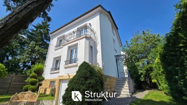 maison/villa 6 pièces.  +++ VISITE VIRTUELLE SUR DEMANDE +++
 Struktur Immobilier vous présente cette maison individuelle de caractère entièrement rénovée, et décorée avec goût.

 Idéalement située au calme, elle profite d'un emplacement privilégié à proximité immédiate de toutes commodités ( Commerces, écoles, banque, centre-ville, Bus et accès A31)

 Construite en 1930 sur un terrain de 9,27 ares (PISCINABLE), elle développe une surface de 184 m2 habitables et se compose comme suit :

 Au rez-de-chaussée : un hall d'entrée dessert un espace vie lumineux de 78 m2 comprenant une cuisine équipée ouverte, un salon séjour avec cheminée à double foyer et une véranda avec accès à la terrasse et au jardin, ainsi qu'un wc séparé avec lave mains,

 Au premier étage, un dégagement, une grande suite parentale avec chambre, dressing, salle de bains meublée avec douche et baignoire. (possiblité de créer 2 chambres)

 Au deuxième étage, deux chambres spacieuses avec dressing, et une salle d'eau avec douche et wc.

 Au sous-sol, un garage, une buanderie et un bureau

 A l'extérieur, un garage double, 4 parkings extérieurs et un jardin clos et arboré prêt à accueillir une piscine.

 Caractéristiques :
 Construction 1930, Construction en pierres, Cuisine équipée( Plaque induction, Lave-vaisselle, four, ilot central, pas de travaux à prévoir, chaudière à condensation Gaz, Portail et portes de garages motorisées, Volets électriques, Alarme, Parquet, terrazzo, prestations et finitions soignées.

 DPE : D/D
 Date de réalisation du diagnostic énergétique : 15/01/2025 Consommation énergie primaire : 244 kWh/m2/an Consommation énergie finale : 227 kWh/m2/an Montant estimé des dépenses annuelles d'énergie pour un usage standard : entre 3 250 EUR et 4 470 EUR sur les années 2021, 2022 et 2023 (abonnements compris).

 Prix honoraire inclus à la charge de l'acquéreur.
 (15000EUR)

 Les informations sur les risques auxquels ce bien est exposé sont disponibles sur le site Géorisques : www.georisques.gouv.fr