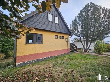 L'Immobilière de l'Attert vous propose cette maison individuelle style chalet à vendre dans le village de Roodt, commune d'Ell.

La maison d'une surface totale de +/- 95 m² construite sur un terrain de 6,30 ares se compose de:

Rdch:
- hall d'entrée
- beau séjour / salle à manger avec cheminée et sortie sur balcon
- spacieuse cuisine équipée séparée
- salle de douche avec lavabo et wc.

1er étage:
- 2 chambres à coucher dont 1 avec petit dressing
- wc séparé.

Sous-sol:
- 1 garage
- caves.

Devant le garage un carport et une belle terrasse derrière la maison avec une très belle vue.

Pour plus d'informations ou pour visiter cette propriété, contactez-nous au +352 23 62 90 20 ou sur immo@immoaida.lu

Consultez nos biens sur www.immoaida.lu

Carport devant le garage, belle terrasse.
