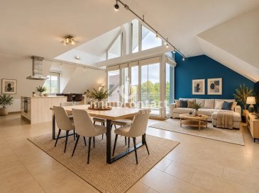 L’agence immobilière Immo-Contact vous propose à la vente ce magnifique appartement de +/− 112 m² habitables (133,63 m² de surface utile), situé au 2áµ‰ et dernier étage d’une résidence avec ascenseur, dans le charmant village de Hunsdorf, commune de Lorentzweiler.

Implanté dans un environnement calme et verdoyant, cet appartement lumineux bénéficie d’une vue imprenable et dégagée sur l’Alzette, sans vis-à-vis, offrant un cadre de vie particulièrement agréable.

À proximité immédiate d’une aire de jeux et d’une piste cyclable, ce bien constitue une opportunité idéale pour les familles ou les personnes recherchant un environnement paisible tout en restant proches des commodités.

L’appartement se compose comme suit 
- Un spacieux et lumineux séjour
- Une cuisine ouverte entièrement équipée
- Une grande chambre de 20,16 m²
- Une deuxième chambre de 12,55 m²
- Une salle de bains
- Un WC séparé
- Un débarras / buanderie

Annexes et équipements :

- Un grenier privatif de 46 m²
- Une cave privative
- Un emplacement de parking intérieur
- Un emplacement de parking extérieur
- Un jardin privatif de 16 m²
- Ascenseur desservant la résidence

Situation et commodités :

Idéalement situé à Hunsdorf, dans la commune recherchée de Lorentzweiler, l’appartement bénéficie d’une excellente accessibilité :

- Gare ferroviaire accessible en seulement 10 minutes à pied
- Connexion rapide vers Luxembourg-ville
- Accès facile aux principaux axes autoroutiers
- Plusieurs lignes de bus et connexions ferroviaires à proximité
- Écoles et crèches à proximité
- Pharmacie, médecin, boulangerie, boucherie et épicerie à moins de 2 minutes en voiture
- Centre de contrôle technique à proximité
- Accès direct à une aire de jeux et à une piste cyclable

Les atouts de ce bien :

Cet appartement séduit par ses volumes généreux, sa luminosité, son emplacement au dernier étage et sa vue dégagée sur un environnement naturel privilégié.

Son grenier privatif de 46 m², ses deux emplacements de stationnement ainsi que son jardin privatif apportent un confort supplémentaire particulièrement appréciable.

Un bien offrant un équilibre idéal entre espace, tranquillité, nature et proximité de Luxembourg-ville.

Certaines photos de cette annonce présentent un home staging virtuel (aménagement généré par IA) afin d’illustrer le potentiel des pièces. Le mobilier et les éléments de décoration ne sont pas inclus dans la vente.

Visites possibles en semaine et le samedi.

Pour toute information complémentaire, contactez-nous au +352 26 311 992 ou par e-mail sur info@immocontact.lu

Estimation gratuite de votre bien sous 48h.

 ---------- 
Immo-Contact Real Estate Agency is pleased to offer for sale this magnificent apartment of approximately 112 m² of living space (133.63 m² of usable space), located on the 2nd and top floor of a residence with an elevator, in the charming village of Hunsdorf, municipality of Lorentzweiler.

Situated in a peaceful and green environment, this bright apartment enjoys stunning, unobstructed views over the Alzette River, with no overlooking neighbors, offering a particularly pleasant living environment.

With a playground and cycling path nearby, this property is an ideal opportunity for families or anyone seeking a peaceful setting while remaining close to all amenities.

The apartment is composed as follows:

- A spacious and bright living room
- A fully equipped open-plan kitchen
- A large bedroom of 20.16 m²
- A second bedroom of 12.55 m²
- A bathroom
- A separate toilet
- A storage room / laundry room

Additional features and facilities:

- A private attic of 46 m²
- A private cellar
- An indoor parking space
- An outdoor parking space
- A private garden of 16 m²
- Elevator serving the residence

Location and amenities:

Ideally located in Hunsdorf, in the sought-after municipality of Lorentzweiler, the apartment benefits from excellent accessibility:

- Train station within just a 10-minute walk
- Quick connections to Luxembourg City
- Easy access to major highways
- Several bus routes and train connections nearby
- Schools and nurseries nearby
- Pharmacy, doctor, bakery, butcher shop, and grocery store less than 2 minutes away by car
- Vehicle inspection center nearby
- Direct access to a playground and cycling path

Highlights of this property:

This apartment stands out for its generous living spaces, natural brightness, top-floor location, and unobstructed views over a beautiful natural setting.

Its private 46 m² attic, two parking spaces, and private garden provide additional comfort and convenience.

A property offering the perfect balance between space, tranquility, nature, and proximity to Luxembourg City.

Some photos in this listing feature virtual home staging (AI-generated furnishings and interior design) to illustrate the potential of the rooms. Furniture and decorative items shown are not included in the sale.

Viewings available on weekdays and Saturdays.

Pour toute information complémentaire, contactez-nous au +352 26 311 992 ou par e-mail sur info@immocontact.lu

Estimation gratuite de votre bien sous 48h.
