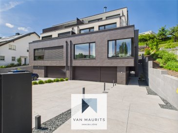 Dans un emplacement privilégié et entourée de verdure, située dans l'un des quartiers résidentiels les plus prisés de Niederanven, cette superbe villa contemporaine datant de 2000, offre un confort absolu et un design raffiné. De grandes baies vitrées assurent une luminosité optimale et une transition fluide vers la terrasse et le jardin avec piscine. Elle est érigée sur un terrain de 8.29 ares sur quatre niveaux avec ascenseur et offre une surface totale de ± 350 m² dont ± 300 m² habitables. 

Elle se compose comme suit : 

Au rez-de-chaussée, la porte s'ouvre sur un spacieux hall d'entrée de ± 24.5 m² qui dessert une chambre de ± 16.5 m², une salle de bains de ± 5 m², une buanderie de ± 7 m², une chaufferie de ± 14.5 m² et un grand garage de ± 40 m². 

Un escalier et un ascenseur mènent au 1er étage où se trouvent le séjour de ± 115 m², la cuisine ouverte équipée et aménagée avec ilot central (cuisine POLIFORM, cuisinière à induction, hotte, four à micro-ondes, four à vapeur, frigo, lave-vaisselle, chauffe-assiettes, frigo à vin, machine à café), une lumineuse salle à manger donnant sur la terrasse sans vis-à-vis et un salon avec cheminée et système home cinéma, ainsi qu'un wc séparé de ± 2 m². 

Au 2e étage un palier de ± 15 m² dessert une chambre avec une salle de bains attenante de ± 22 m², deux chambres de ± 13.5 m² donnant sur une terrasse de ± 12 m² et une salle de bains de ± 7 m². 

Au 3e étage un palier de ± 4 m² dessert la suite parentale de ± 36.5 m² avec armoires intégrées avec salle de bains attente de ± 36.5 m² donnant sur deux terrasses avec une vue imprenable avec jacuzzi de ± 26 m² et de ± 14 m² et un wc séparé de ± 2 m². 

A l'extérieur, une belle terrasse de ± 50 m², une piscine chauffée ainsi qu'un jardin clôturé et arboré avec une dépendance de ± 10 m² complètent ce bien d'exception. 

Détails complémentaires : 

- Situation idéale au calme 
- Maison en excellent état 
- Pompe à chaleur, chauffage au plafond 
- CPE A-A-A 
- Adoucisseur d'eau 
- Châssis bois/alu, triple vitrage 
- Volets électriques 
- Domotique 
- Fibre optique 
- Spots intégrés 
- Système home cinéma 
- Porte d'entrée sécurisée 
- Meubles sur mesure - POLIFORM 
- Cuisine - POLIFORM 
- Électroménager ? MIELE 
- Parquet 
- Carrelage 
- 4 terrasses 
- Jardin 
- Eclairage jardin 
- Abri de jardin 
- Piscine chauffée 
- Jacuzzi 
- Grand garage 
- Écoles, crèches, parcs, aires de jeux, restaurants, commerces 
- Desservi par les transports en commun 

Personne responsable du bien : 

Yuliana Dimitrova 
Tel : +352 661 50 27 19 
Email : yuliana@vanmaurits.lu