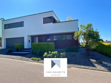 Modern Family Villa with Garden, Pond, Gym & Sauna - Border of Luxembourg, Wincheringen

Located in the picturesque town of Wincheringen, just moments from the Mosel River and the Luxembourg border, this beautifully crafted family home blends generous space, modern comfort, and architectural elegance. Designed by an architect, the interiors feature expansive windows that flood the home with natural light and highlight its clean, contemporary lines.

Built in 2016 on a spacious 823 m² plot with ideal sun exposure, the property offers 337 m² of refined living space tailored to modern lifestyles. Bright, open interiors are paired with high-end finishes and thoughtful design details throughout. A state-of-the-art geothermal heating/cooling floor system and a double flow ventilation unit (VMC) ensures year-round comfort, while an advanced home automation setup enables remote control of all windows and lighting for maximum convenience and A+ energy efficiency.

Upon entry, a welcoming hall (5 m²) leads to a spacious open-plan living and dining area of 58 m². 
This impressive space offers lovely views over the private garden and its serene, landscaped artificial pond. 
The fully equipped kitchen (13 m²) is modern and practical, ideal for both everyday living and entertaining. 
Located near the entrance, the 14 m² room offers an ideal space for a quiet home office or a welcoming guest room, combining practicality with comfort.
Also on this level are a guest WC with shower (4 m²), a convenient storage room (2 m²), and access to a large terrace with direct entry to the garden - an ideal space for outdoor meals, relaxation, and family enjoyment.

Upstairs, the home features three generous bedrooms measuring 20 m², 20 m², and 16 m². 
The master suite includes a private dressing room (7 m²), an en-suite showerroom (8 m²), and direct access to the upper-floor balcony - offering a peaceful spot to enjoy the view of the garden. 
The upper floor also includes a spacious 22 m² gallery, a 24 m² gym/SPA, and a dedicated laundry room (7 m²). 
A stylish 9 m² bathroom is complemented by a private sauna, located adjacent to the gym, offering a true wellness experience at home.

Completing the property is a 29 m² garage and a 13 m² technical room on the entry level, providing excellent storage and functionality.

This well-maintained villa offers a rare opportunity to enjoy tranquil living just across the border from Luxembourg, with shops, schools, daycare, and transport links all close by. Whether you're commuting, working from home, or simply enjoying the beauty of the Mosel region, this property has everything you need.

The buyer's commission of 1.25 % of the purchase price plus VAT 17%, becomes due and payable upon notarization of the purchase agreement.

Contact:
Juha Ahonen
+352 661 249 476
juha@vanmaurits.lu

Villa Familiale Moderne avec Jardin, Étang, Salle de Sport & Sauna - Frontière Luxembourg, Wincheringen

Située dans la charmante commune de Wincheringen, à deux pas de la Moselle et de la frontière luxembourgeoise, cette villa familiale d'architecte allie avec élégance volumes généreux, confort moderne et lignes épurées. De grandes baies vitrées baignent les espaces de lumière naturelle, mettant en valeur le design contemporain et l'ambiance chaleureuse des lieux.

Construite en 2016 sur un terrain de 823 m² idéalement orienté, la maison propose une surface habitable de 337 m², parfaitement adaptée au mode de vie moderne. Les intérieurs lumineux sont rehaussés de finitions haut de gamme et de nombreux détails de conception soignés. Un système de chauffage/refroidissement par le sol géothermique à la pointe de la technologie, associé à une VMC double flux, assure un confort optimal toute l'année, tandis qu'une domotique avancée permet de contrôler à distance l'ensemble des fenêtres et de l'éclairage, pour un maximum de confort et d'efficacité énergétique A+.

Dès l'entrée, un hall accueillant de 5 m² ouvre sur une vaste pièce de vie de 58 m² regroupant salon et salle à manger. Cet espace convivial offre une vue dégagée sur le jardin privatif et son étang paysager.
La cuisine entièrement équipée de 13 m² est à la fois moderne et fonctionnelle, idéale pour le quotidien comme pour recevoir.
Une pièce de 14 m², située près de l'entrée, peut faire office de bureau calme ou de chambre d'amis confortable.
Un WC avec douche (4 m²), un espace de rangement (2 m²) et une grande terrasse avec accès direct au jardin complètent ce niveau ? parfait pour les repas en extérieur, les moments de détente ou les jeux en famille.

À l'étage, trois belles chambres de 20 m², 20 m² et 16 m² offrent un cadre paisible pour toute la famille.
La suite parentale dispose d'un dressing privatif (7 m²), d'une salle de douche attenante (8 m²) et d'un accès direct au balcon du premier étage - un coin idéal pour profiter de la vue sur le jardin.
Le niveau comprend également une galerie spacieuse de 22 m², une salle de sport/SPA de 24 m² et une buanderie indépendante de 7 m².
Une salle de bain élégante de 9 m² est accompagnée d'un sauna privé, situé juste à côté de la salle de sport, pour une véritable expérience bien-être à domicile.
Un garage de 29 m² et un local technique de 13 m² au rez-de-chaussée offrent un espace de rangement optimal et un excellent niveau de fonctionnalité.

Parfaitement entretenue, cette villa unique représente une opportunité rare de vivre au calme à deux pas du Luxembourg, avec commerces, écoles, crèches et transports à proximité. Que vous soyez frontalier, télétravailleur ou amoureux de la région de la Moselle, cette maison a tout pour plaire.

La commission d'achat, fixée à 1,25 % du prix de vente hors TVA (17 %), est due et payable à la signature de l'acte notarié.

Contact :
Juha Ahonen
+352 661 249 476
juha@vanmaurits.lu


Moderne Familienvilla mit Garten, Teich, Fitnessraum & Sauna - Grenznähe Luxemburg, Wincheringen

Diese architektonisch gestaltete Familienvilla befindet sich im idyllischen Wincheringen, nur wenige Schritte von der Mosel und der luxemburgischen Grenze entfernt. Sie verbindet großzügige Wohnflächen, modernen Komfort und stilvolle Eleganz auf beeindruckende Weise. Große Fensterflächen durchfluten das Haus mit Tageslicht und unterstreichen die klare, zeitgemäße Linienführung.

Das 2016 erbaute Haus steht auf einem großzügigen Grundstück von 823 m² mit idealer Sonnenausrichtung und bietet 290 m² hochwertig ausgestattete Wohnfläche - perfekt zugeschnitten auf ein modernes Familienleben. Helle, offene Räume, edle Materialien und durchdachte Details schaffen ein wohnliches Ambiente. Ein hochmodernes geothermisches Fußbodenheiz- und -kühlsystem in Kombination mit einer kontrollierten Wohnraumlüftung mit Wärmerückgewinnung (KWL) sorgt ganzjährig für optimalen Wohnkomfort, während eine fortschrittliche Smart-Home-Steuerung die Fernbedienung sämtlicher Fenster und der Beleuchtung ermöglicht ? für maximale Bequemlichkeit und hohe Energieeffizienz A+.

Im Eingangsbereich empfängt Sie ein freundlicher Flur (5 m²), der in einen offenen Wohn- und Essbereich von 58 m² führt.
Große Fenster eröffnen den Blick auf den privaten Garten mit seinem harmonisch angelegten Zierteich.
Die moderne, voll ausgestattete Küche (13 m²) ist funktional und stilvoll - ideal für den Alltag und für Gäste.
Ein zusätzliches Zimmer (14 m²) nahe dem Eingang eignet sich hervorragend als ruhiges Homeoffice oder als Gästezimmer.
Ein Gäste-WC mit Dusche (4 m²), ein praktischer Abstellraum (2 m²) sowie eine großzügige Terrasse mit direktem Zugang zum Garten runden das Erdgeschoss ab - perfekt für Mahlzeiten im Freien, Erholung oder Spiel mit der Familie.

Im Obergeschoss befinden sich drei großzügige Schlafzimmer mit 20 m², 20 m² und 16 m².
Die Elternsuite verfügt über ein eigenes Ankleidezimmer (7 m²), ein modernes Duschbad (8 m²) sowie direkten Zugang zum Balkon mit Blick in den Garten - ein idealer Rückzugsort.
Eine offene Galerie (22 m²), ein Fitness- und SPA-Bereich (24 m²) sowie ein separater Hauswirtschaftsraum (7 m²) ergänzen das Obergeschoss.
Ein stilvolles Badezimmer (9 m²) und eine angrenzende Sauna bieten Wellness pur - ganz privat in den eigenen vier Wänden.

Komplettiert wird das Haus durch eine geräumige Garage (29 m²) und einen Technikraum (13 m²) im Eingangsbereich - funktional und durchdacht.
Diese gepflegte Villa bietet eine seltene Gelegenheit, ruhiges Wohnen in unmittelbarer Nähe zu Luxemburg zu genießen - mit Einkaufsmöglichkeiten, Schulen, Kindergärten und Verkehrsanbindung in nächster Umgebung. Ob für Berufspendler, Homeoffice-Nutzer oder Naturliebhaber der Moselregion - dieses Haus erfüllt alle Ansprüche.

Die Käuferprovision in Höhe von 1,25 % des Kaufpreises zuzüglich 17 % MwSt. ist mit Beurkundung des Kaufvertrags fällig und zahlbar.

Kontakt:
Juha Ahonen
+352 661 249 476
juha@vanmaurits.lu