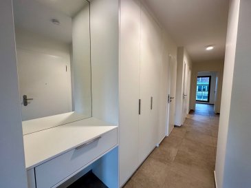 Le Bureau Immobilier Loewen-Kill présente à la location cet appartement neuf sis à Bivange, 5, Rue de la Gare, à 50 mètres de la gare, se composant comme suit :

.Hall d’entrée avec vestiaire intégré
.Salon/Salle à manger ouverte sur la cuisine équipée et aménagée de la marque Schüller ; l’électroménager est de la marque AEG : four, plaque de cuisson, hotte suspendue, lave-vaisselle, frigo-congélateur, niche pouvant accueillir un micro-ondes. Depuis cette pièce une loggia est accessible (d’une surface d’environ 10,30m2)
.Débarras
.WC séparé
.Salle de bains avec baignoire
.Première chambre à coucher
.Seconde chambre à coucher avec armoire intégrée et salle de douche (avec WC) attenante

L’appartement est complété par :
.Cave privative (n°42)
.Emplacement intérieur (n°51) avec prise électrique 
.Emplacement dans la buanderie commune 
.Emplacement dans le local vélos/poussettes

En ce qui concerne les équipements de l’appartement, il convient de préciser :
.Il s’agit d’une nouvelle construction qui sera mise en location pour la première fois
.L’appartement est équipé d’un système de ventilation à double flux
.Sont installés des luminaires dans l’appartement
.Les fenêtres en triple vitrage sont équipées de stores extérieurs
.Un système de domotique pour les volets, les lampes et le chauffage est installé dans l’appartement
.La fibre optique est présente dans l’appartement

En ce qui concerne la situation géographique de l’appartement :
.La gare de Berchem se trouve à 50 mètres de la résidence, des trains en direction de la gare centrale de Luxembourg et la gare de Belval arrivent toutes les 30 minutes
.La Cloche d’Or et le Kirchberg se trouvent à environ 20 minutes en voiture
.Des commerces de proximité sont à proximité, ainsi que des écoles, crèches

Nous sommes à votre disposition pour tout renseignement complémentaire et un rendez-vous de visite :
contact@loki.lu
+352 27 56 28 90

Les honoraires de négociation sont à la charge du locataire et s’élèvent à un mois de loyer augmenté de la TVA de 16 %.