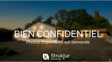 BIEN CONFIDENTIEL.  Maison de Charme - espace bien-être 70 m2 - dépendance aménageable
 À proximité immédiate d'Audun-le-Roman et à moins de 20 minutes de la frontière luxembourgeoise, cette maison de caractère d'environ 300 m2 offre un cadre de vie privilégié, au calme, tout en restant proche des axes et des commodités.
 Une dépendance indépendante de 48 m2 complète l'ensemble. Facile à aménager, elle peut accueillir un atelier, une activité libérale, un studio indépendant ou un espace locatif, selon les projets.
 Construite vers 1850 et récemment rénovée, la maison a su conserver son authenticité sans être dénaturée. Pierres et poutres apparentes, cheminées anciennes, four à pain, puits, cave voutée et éléments d'époque participent à une atmosphère chaleureuse.
 Le rez-de-chaussée s'organise autour d'une cuisine entièrement équipée et conviviale, dont l'espace de cuisson est intégré à une cheminée monumentale. Elle s'ouvre sur un salon-séjour, dans la continuité duquel se trouve un espace de réception avec bar, où le puits valorisé par une plaque de verre, et le four à pain deviennent de véritables éléments décoratifs, avec un accès direct à une cave voûtée qui ravira les amateurs de vin. La cuisine bénéficie également d'un accès direct à une seconde terrasse. Une salle d'eau avec WC et une buanderie complètent ce niveau.
 À l'étage, trois chambres aux volumes confortables avec dressing, une salle d'eau avec douche et wc, un bureau (4ème ch possible) et une mezzanine offrent une organisation fluide, adaptée à une vie de famille.
 L'espace bien-être de 70 m2 constitue un atout rare : sauna, jacuzzi, douche, WC et une salle de sport en mezzanine, avec accès direct à une terrasse et au jardin clos de murs et à l'abri des regards.
 Le terrain de 11,52 ares propose également deux garages et plusieurs stationnements, facilitant le quotidien.
 Un bien avec du caractère, des volumes et encore du potentiel, particulièrement adapté à une clientèle frontalière recherchant un cadre de vie qualitatif proche de toutes commodités.
  
 Caractéristiques : Construction en pierre, Toiture et façade refaites en 2024, Chauffage par chaudière à pellets avec alimentation automatique, Climatisation, Double vitrage PVC avec volets roulants électriques programmables, Adoucisseur d'eau, puits intérieur et extérieur.    Cuisine équipée : Induction et Lave-vaisselle SIEMENS, Hotte ROBLIN, Four ELECTROLUX, Friteuse et Grill SMEG, réfrigérateur US, espace repas et larges plans de travail.
 DPE : D / D
 Infos et visites : Contactez Régis au 06 03 40 96 27