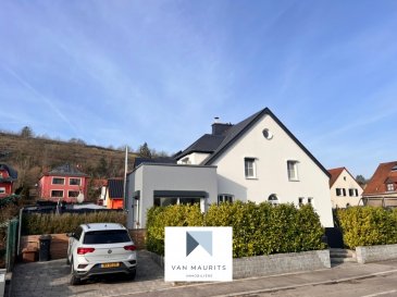 Renovated Semi-Detached Family Home with Terrace and Garden

This semi-detached single-family home, free on three sides, was originally built in 1955 and extensively renovated in 2016, with additional improvements carried out in 2022, 2023, and 2024. The house is arranged over a ground floor, first floor, attic level, and a full basement, offering a practical and well-balanced layout.

On the ground floor, the property comprises an entrance hall, a shower room, a 16 m² kitchen, a 22 m² dining room, and a 15 m² living room. The living area was extended during the 2016 renovation and fitted with large French doors, creating a bright and open space, complemented by a modern fireplace.

The first floor features a spacious bedroom with an adjoining bathroom and access to a 13 m² terrace, as well as a 10 m² bedroom with access to the attic level, which provides an additional bedroom.

The basement has been arranged as a studio-style space with a bedroom, a shower room, and a technical/laundry room, making it suitable for guests or independent use.

The 2016 renovation included new gas and electrical installations, updated sanitary fittings, a fully equipped kitchen with SIEMENS appliances, a newly insulated façade, a slate roof, and overall interior modernization. More recent upgrades include new flooring, new kitchen tiling, and wall refinishing throughout the ground floor (2022), as well as built-in wardrobes and bathroom furniture on the first floor and a fitted laundry room (2023).

Outside, the property benefits from a private garden and parking for one vehicle (plus one street permit included). The garden was further improved with hedge planting in 2022, as well as the addition of terrace walls and a garden gate in 2024.

Contact:
Juha Ahonen
+352 661 249 476


Renoviertes Reihenendhaus mit Terrasse und Garten

Dieses einseitig angebaute Einfamilienhaus, frei an drei Seiten, wurde ursprünglich im Jahr 1955 erbaut und 2016 umfassend renoviert. Weitere Modernisierungen erfolgten in den Jahren 2022, 2023 und 2024. Das Haus erstreckt sich über das Erdgeschoss, das Obergeschoss, das Dachgeschoss sowie ein vollständig unterkellertes Untergeschoss und bietet eine praktische, ausgewogene Raumaufteilung.

Im Erdgeschoss befinden sich eine Eingangshalle, ein Duschbad, eine Küche (16 m²), ein Esszimmer (22 m²) sowie ein Wohnzimmer (15 m²). Im Rahmen der Renovierung im Jahr 2016 wurde der Wohnbereich erweitert und mit großen Fenstertüren ausgestattet, wodurch ein heller und offener Wohnraum entstanden ist. Ein moderner Kamin unterstreicht zusätzlich die wohnliche Atmosphäre.

Das Obergeschoss umfasst ein großzügiges Schlafzimmer mit angrenzendem Badezimmer und Zugang zu einer Terrasse (13 m²) sowie ein weiteres Schlafzimmer (10 m²) mit Zugang zum Dachgeschoss, das ein zusätzliches Schlafzimmer bietet.

Das Untergeschoss wurde als studioähnlicher Bereich gestaltet und verfügt über ein Schlafzimmer, ein Duschbad sowie einen Technik- und Hauswirtschaftsraum. Dadurch eignet sich dieser Bereich ideal für Gäste oder eine unabhängige Nutzung.

Die umfassende Renovierung im Jahr 2016 umfasste die Erneuerung der Gas- und Elektroinstallationen, die Modernisierung der sanitären Anlagen, den Einbau einer voll ausgestatteten Küche mit Geräten von SIEMENS, die Dämmung der Fassade, ein Schieferdach sowie eine vollständige Modernisierung des Innenbereichs. Zu den jüngeren Verbesserungen zählen neue Bodenbeläge, neue Küchenfliesen und die Überarbeitung der Wandoberflächen im gesamten Erdgeschoss (2022) sowie maßgefertigte Einbauschränke und Badmöbel im Obergeschoss und ein eingerichteter Hauswirtschaftsraum (2023).

Im Außenbereich bietet die Immobilie einen privaten Garten sowie einen Stellplatz für ein Fahrzeug; zusätzlich ist ein Anwohnerparkausweis für einen weiteren Stellplatz vorhanden. Der Garten wurde 2022 durch die Anpflanzung von Hecken weiter aufgewertet. Im Jahr 2024 kamen zudem Terrassenmauern und ein Gartentor hinzu.

Kontakt:
Juha Ahonen
+352 661 249 476
juha@vanmaurits.lu


Maison familiale jumelée rénovée avec terrasse et jardin

Cette maison unifamiliale jumelée, libre de trois côtés, a été construite à l'origine en 1955 et a fait l'objet d'une rénovation complète en 2016, complétée par de nouvelles améliorations en 2022, 2023 et 2024. Répartie sur le rez-de-chaussée, le premier étage, les combles ainsi qu'un sous-sol complet, elle offre une configuration à la fois pratique et harmonieuse.

Le rez-de-chaussée comprend un hall d'entrée, une salle de douche, une cuisine (16 m²), une salle à manger (22 m²) ainsi qu'un séjour (15 m²). Lors de la rénovation de 2016, l'espace de vie a été agrandi et équipé de grandes portes-fenêtres, créant ainsi une pièce lumineuse et ouverte, sublimée par une cheminée contemporaine.

Le premier étage se compose d'une chambre spacieuse avec salle de bains attenante et accès à une terrasse (13 m²), ainsi que d'une chambre (10 m²) donnant accès aux combles, où se trouve une chambre supplémentaire.

Le sous-sol a été aménagé dans un esprit studio et comprend une chambre, une salle de douche ainsi qu'un local technique / buanderie, ce qui en fait un espace idéal pour accueillir des invités ou pour un usage plus indépendant.

La rénovation de 2016 a notamment porté sur le renouvellement des installations de gaz et d'électricité, la modernisation des équipements sanitaires, l'installation d'une cuisine entièrement équipée avec des appareils SIEMENS, l'isolation de la façade, la réfection de la toiture en ardoise ainsi qu'une modernisation complète de l'intérieur. Les améliorations plus récentes comprennent la pose de nouveaux revêtements de sol, un nouveau carrelage dans la cuisine et la remise en état des murs sur tout le rez-de-chaussée (2022), ainsi que l'installation de placards intégrés et de meubles de salle de bains au premier étage, de même qu'une buanderie aménagée (2023).

À l'extérieur, la propriété bénéficie d'un jardin privatif ainsi que d'un emplacement de stationnement pour un véhicule, avec en complément un permis de stationnement résidentiel pour une voiture supplémentaire. Le jardin a encore été valorisé en 2022 par la plantation de haies, puis en 2024 par l'ajout de murets de terrasse et d'un portillon.

Contact :
Juha Ahonen
+352 661 249 476
juha@vanmaurits.lu
