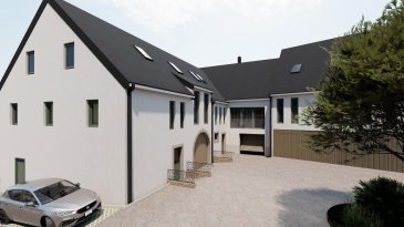 Charme d'antan et confort moderne ? 7 appartements de standing dans une ancienne ferme rénovée à Bastendorf

Découvrez une résidence de caractère où l'authenticité du passé s'allie harmonieusement au confort d'aujourd'hui. Située au cœur du paisible village de Bastendorf, cette ferme luxembourgeoise typique a été entièrement rénovée pour accueillir 7 appartements haut de gamme, alliant architecture traditionnelle et prestations contemporaines.

Chaque logement a été conçu pour préserver l'âme du bâtiment : poutres apparentes, pierre naturelle, volumes généreux, tout en intégrant les dernières technologies en matière de confort et de performance énergétique :
	Chauffage au sol
	isolation thermique de haute qualité
	Équipements modernes dans un cadre chargé d'histoire

Points forts du projet :
	 Appartements de 1 à 3 chambres, tous au design unique
	 Espace extérieur commun aménagé dans la cour intérieure de l'ancienne ferme
	 intérieurs lumineux, matériaux nobles et ambiance chaleureuse
	 Parkings privatifs et caves individuelles
	 Situation calme, à proximité directe de Diekirch, Ettelbruck et des grands axes

Description du Triplex :

Dès l'entrée, un hall spacieux vous accueille et donne accès directement au garage double ainsi qu'à une cave privative, idéale pour le rangement ou un espace de loisirs supplémentaire. Ce niveau comprend également une chambre avec salle de bains privative ainsi qu'un WC séparé, parfait pour recevoir ou créer un espace indépendant.

Au premier étage, la pièce de vie principale s'organise autour d'une cuisine ouverte, d'un salon et d'une salle à manger réunis dans un espace généreux et lumineux. Le vide sur séjour crée une belle hauteur sous plafond et renforce la sensation d'espace tout en laissant entrer une abondante lumière naturelle.

L'étage suivant abrite deux belles chambres lumineuses supplémentaires et une salle de bains, offrant un espace nuit confortable et bien séparé.

Personnalisation possible : finitions intérieures, aménagements, choix des matériaux chaque maisonette peut être adaptée à vos envies afin de créer un lieu de vie unique, alliant caractère et modernité.

Contactez-nous dès aujourd'hui pour recevoir la brochure, plus d'informations ou planifier une visite privée.