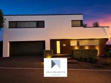 Villa d'architecte moderne avec jardin, étang, espace fitness & sauna - maison prête à emménager à Wincheringen, à proximité de la frontière luxembourgeoise

Située dans le cadre pittoresque de Wincheringen, à seulement quelques minutes de la Moselle et de la frontière luxembourgeoise, cette villa familiale moderne associe de généreux volumes, une technologie de construction de haut niveau et une architecture contemporaine élégante.

Construite en 2016 sur un vaste terrain de 823 m² bénéficiant d'une excellente exposition, la propriété offre une surface habitable de 337 m² et a été conçue avec une attention particulière portée au confort, à l'efficacité énergétique et à la qualité de vie à long terme. Conçue par un architecte, la maison séduit par ses lignes contemporaines épurées, ses grandes surfaces vitrées et ses intérieurs lumineux et ouverts, créant un lien harmonieux entre les espaces de vie et le jardin paysager.

L'un des atouts majeurs de cette propriété réside dans son concept technique de grande qualité. La villa est équipée d'un système géothermique de chauffage et de refroidissement par le sol, assurant un confort thermique agréable tout au long de l'année. Ce dispositif est complété par une ventilation mécanique contrôlée double flux avec récupération de chaleur, garantissant un apport constant d'air frais tout en contribuant à l'excellente performance énergétique A+ de la maison. Une domotique moderne vient encore renforcer le confort au quotidien, permettant le contrôle à distance des fenêtres et de l'éclairage. Ces équipements techniques font de cette propriété un choix particulièrement attractif pour les acquéreurs à la recherche d'une maison moderne, tournée vers l'avenir, à faible consommation énergétique et offrant un haut niveau de confort.

Le rez-de-chaussée s'ouvre sur un hall d'entrée accueillant (5 m²), menant vers un impressionnant espace de vie ouvert comprenant salon et salle à manger (58 m²). Cette pièce lumineuse et spacieuse constitue le cœur de la maison et bénéficie, grâce à ses grandes baies vitrées, d'une belle vue sur le jardin privé et son élégant étang artificiel paysager. La cuisine entièrement équipée (13 m²), moderne et fonctionnelle, est parfaitement adaptée aussi bien à la vie quotidienne qu'aux moments de convivialité.

Ce niveau comprend également une pièce séparée (14 m²), pouvant être utilisée comme bureau, chambre d'amis ou chambre supplémentaire selon les besoins. Un WC séparé avec douche (4 m²), un débarras pratique (2 m²), ainsi qu'un accès direct à la grande terrasse complètent le rez-de-chaussée. La terrasse s'ouvre directement sur le jardin et offre un cadre idéal pour les repas en plein air, la détente et la vie de famille.

À l'étage, la maison dispose de trois chambres spacieuses (20 m², 20 m² et 16 m²). La suite parentale comprend un dressing privatif (7 m²), une salle de douche en suite (8 m²), ainsi qu'un accès direct au balcon de l'étage, offrant une vue paisible sur le jardin.

Ce niveau comprend également une vaste galerie (22 m²), qui apporte une belle sensation d'ouverture et d'élégance à l'architecture intérieure. Un espace fitness/SPA dédié (24 m²), situé à proximité immédiate du sauna privé, crée un véritable espace bien-être au sein de la maison. Une salle de bain élégante (9 m²) ainsi qu'une buanderie séparée (7 m²) complètent l'agencement pratique et confortable de cet étage.

Au niveau d'entrée, la villa comprend également un garage (29 m²) ainsi qu'un local technique (13 m²), offrant une excellente fonctionnalité, des espaces de rangement pratiques et un accès facile aux installations techniques de la maison.

La propriété est prête à emménager et offre en outre la possibilité de conserver le mobilier et les équipements actuellement présents dans la maison, selon accord. Cette option rend l'installation particulièrement simple et attractive pour les acquéreurs recherchant une maison entièrement préparée, sans travaux ni aménagements importants à prévoir.

Cette villa parfaitement entretenue représente une opportunité rare d'acquérir une maison familiale techniquement avancée et économe en énergie, dans un environnement paisible, à proximité immédiate de la frontière luxembourgeoise. Commerces, écoles, crèches, transports publics et connexions transfrontalières se trouvent à proximité, ce qui rend la propriété idéale pour les familles, les frontaliers travaillant au Luxembourg ou les acquéreurs à la recherche d'une maison moderne dans la région de la Moselle.

Grâce à sa combinaison d'architecture contemporaine, de technologie de construction performante, de volumes généreux, d'un espace bien-être privé et d'un état prêt à emménager, cette villa offre un cadre de vie complet, confortable et résolument tourné vers l'avenir.

La commission d'agence à charge de l'acquéreur, s'élevant à 1,25 % du prix de vente, majorée de la TVA à 17 %, est due et payable au moment de la signature de l'acte notarié.

Contact :
Juha Ahonen
+352 661 249 476
juha@vanmaurits.lu