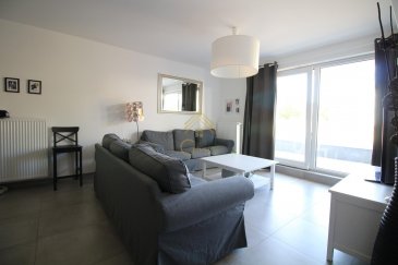 Real G Immo a le plaisir de vous présenter ce bel appartement de +/- 68 m² dans une résidence construite en 2007 qui comporte 8 unité.<br><br>Celui-ci se compose comme suit : <br><br>Hall d\'entrée, cuisine équipée ouverte sur living avec accès à un balcon m², 2 chambres à coucher, salle de douche, buanderie commune.<br><br>A ce bien s\'ajoute un emplacement intérieur. <br><br>Pour plus de renseignement ou visite des lieux, nous restons à votre disposition au 28.66.39.1.<br><br>Visite possible le samedi sur rendez-vous.<br><br>REAL G IMMO vous accompagne dans toutes vos démarches administratifs et financières. Nous réalisons également une ESTIMATION GRATUITE de votre bien.<br><br>Les prix s\'entendent frais d\'agence de 3 % TVA 16 % inclus.