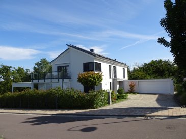 Modern and Private Home in Wincheringen 

Located just across the Mosel River on the German side, this elegant and contemporary home in Wincheringen offers the perfect blend of comfort, privacy, and functionality.

Completed in September 2020, this spacious property features 229m2 of living space on a 1,192m2 plot, combining modern design with an exceptional setting: the most private location in a quiet cul-de-sac, with privacy on three sides and direct access to the forest. 

Ground Floor:
Upon entering, you are welcomed by a spacious entry hall (8m2) leading into a bright and open living area.
The open plan kitchen (17m2), dining area (22m2), and living room (24m2) create a seamless flow, ideal for modern living.
The kitchen, equipped with high-quality ORF wine cellar, features a granite countertop island that enhances both style and functionality. 

From the living area, you have direct access to two terraces (54m2 and 18m2), offering beautiful outdoor spaces for dining, entertaining, and relaxation. 

Additional rooms on the ground floor include:
- Bedroom (13m2)
- Bathroom with shower (11m2)
- Pantry and storage room (5m2)
- Utility and technical room (15m2)
- Wardrobe (2m2)
- Double garage (36m2) with EV outlet
- Garage storage room (6m2) 

First Floor:
The upper floor boasts a master bedroom (23m2) providing ample storage with an adjacent dressing room (7m2), providing ample storage, and a spacious bathroom (12m2). Top floor rooms have access to a balcony and a veranda.

For relaxation and well-being, this level includes a wellness area (22m2), and a sauna (3m2) ? perfect for unwinding in the comfort of your own home.

Additionally, there are two further bedrooms, a 9m2 office, and a flexible library/study area, offering multiple options for remote work or study.

A hallway (15m2) connects the rooms, ensuring a comfortable and practical layout. 

Additional Features:
- Insulated attic (22m2)
- Efficient heat pump heating system
- Solar panels, batteries and EV charger
- Modern and high-quality finishes throughout
- Spacious outdoor areas designed for relaxation and entertainment
- Double garage, security door and three exterior parking spaces
- Buyer's commission 30,000€, VAT included  

This home is an excellent choice for those seeking a modern and energy-efficient property in a peaceful, yet well-connected location, with easy access to Luxembourg while enjoying privacy, nature, and the charm of the German countryside. 

Contact:
Juha Ahonen
+352 661 249 476
Juha@vanmaurits.lu 


Modernes und privates Haus in Wincheringen

Unmittelbar jenseits der Mosel auf der deutschen Seite gelegen, bietet dieses elegante und zeitgemäße Zuhause in Wincheringen die perfekte Verbindung aus Komfort, Privatsphäre und Funktionalität.

Fertiggestellt im September 2020, verfügt diese großzügige Immobilie über 229m2 Wohnfläche auf einem 1.192m2 großen Grundstück und verbindet modernes Design mit einer außergewöhnlichen Lage: die privateste Position am Ende einer ruhigen Sackgasse, mit Privatsphäre auf drei Seiten und direktem Zugang zum Wald.

Erdgeschoss:
Beim Betreten begrüßt Sie eine großzügige Diele (8m2), die in einen hellen, offenen Wohnbereich führt.
Die offene Küche (17m2), der Essbereich (22m2) und das Wohnzimmer (24m2) bilden einen nahtlosen Übergang - ideal für modernes Wohnen.

Die Küche, ausgestattet mit einem hochwertigen ORF-Weinkeller, verfügt über eine Granit-Inselarbeitsplatte, die Stil und Funktionalität gleichermaßen unterstreicht.

Vom Wohnbereich aus gelangen Sie direkt auf zwei Terrassen (54m2 und 18m2), die schöne Außenbereiche zum Essen, Empfangen von Gästen und Entspannen bieten.

Weitere Räume im Erdgeschoss:
- Schlafzimmer (13m2)
- Badezimmer mit Dusche (11m2)
- Speisekammer und Abstellraum (5m2)
- Hauswirtschafts- und Technikraum (15m2)
- Garderobe (2m2)
- Doppelgarage (36m2) mit EV-Anschluss
- Garagen-Abstellraum (6m2)

Obergeschoss:
Das Obergeschoss bietet ein Hauptschlafzimmer (23m2) mit angrenzender Ankleide (7m2), die reichlich Stauraum bietet, sowie ein großzügiges Badezimmer (12m2). Die Zimmer im Obergeschoss haben Zugang zu einem Balkon und einer Veranda.

Für Entspannung und Wohlbefinden umfasst diese Ebene einen Wellnessbereich (22m2) und eine Sauna (3m2) - perfekt, um im eigenen Zuhause zur Ruhe zu kommen.

Außerdem gibt es zwei weitere Schlafzimmer, ein Büro (9m2) und einen flexiblen Bibliotheks-/Arbeitsbereich, der mehrere Optionen für Homeoffice oder Studium bietet.

Ein Flur (15m2) verbindet die Räume und sorgt für eine komfortable und praktische Aufteilung.

Weitere Merkmale:
- Gedämmter Dachboden (22m2)
- Effiziente Wärmepumpenheizung
- Solarmodule, Batteriespeicher und EV-Ladestation
- Moderne und hochwertige Ausführung im gesamten Haus
- Großzügige Außenbereiche für Entspannung und Geselligkeit
- Doppelgarage, Sicherheitstür und drei Außenstellplätze
- Käuferprovision 30.000 €, inkl. MwSt.

Dieses Haus ist eine ausgezeichnete Wahl für alle, die eine moderne und energieeffiziente Immobilie in ruhiger, zugleich gut angebundener Lage suchen - mit schneller Erreichbarkeit von Luxemburg sowie Privatsphäre, Natur und dem Charme der deutschen Landschaft.

Kontakt:
Juha Ahonen
+352 661 249 476
juha@vanmaurits.lu

Maison moderne et privée à Wincheringen
Située juste de l'autre côté de la Moselle, côté allemand, cette maison élégante et contemporaine à Wincheringen offre un parfait équilibre entre confort, intimité et fonctionnalité.

Achevée en septembre 2020, cette propriété spacieuse propose 229m2 d'espace de vie sur un terrain de 1,192m2, alliant design moderne et cadre d'exception : l'emplacement le plus privé au bout d'une impasse calme, avec intimité sur trois côtés et accès direct à la forêt.

Rez-de-chaussée :
À l'entrée, un hall spacieux (8m2) vous accueille et mène vers un espace de vie lumineux et ouvert.
La cuisine ouverte (17m2), la salle à manger (22m2) et le séjour (24m2) créent une circulation fluide, idéale pour un mode de vie moderne.

La cuisine, équipée d'une cave à vin ORF de haute qualité, se distingue par un îlot en granit qui renforce à la fois le style et la fonctionnalité.

Depuis l'espace de vie, vous accédez directement à deux terrasses (54m2 et 18m2), offrant de beaux espaces extérieurs pour dîner, recevoir et se détendre.

Pièces supplémentaires au rez-de-chaussée :
- Chambre (13m2)
- Salle de bains avec douche (11m2)
- Garde-manger et débarras (5m2)
- Buanderie et local technique (15m2)
- Vestiaire (2m2)
- Double garage (36m2) avec prise pour véhicule électrique
- Local de rangement du garage (6m2)

Premier étage :
L'étage supérieur comprend une chambre parentale (23m2) avec dressing attenant (7m2) offrant un vaste espace de rangement, ainsi qu'une salle de bains spacieuse (12m2). Les pièces de l'étage ont accès à un balcon et à une véranda.

Pour la détente et le bien-être, ce niveau inclut un espace wellness (22m2) et un sauna (3m2) - parfaits pour se relaxer dans le confort de votre maison.

S'y ajoutent deux autres chambres, un bureau de 9m2, et un espace bibliothèque/étude modulable, offrant de multiples options pour le télétravail ou les études.

Un couloir (15m2) relie les pièces, garantissant une distribution confortable et pratique.

Caractéristiques supplémentaires :
- Combles isolés (22m2)
- Système de chauffage efficace par pompe à chaleur
- Panneaux solaires, batteries et borne de recharge pour véhicule électrique
- Finitions modernes et haut de gamme dans toute la maison
- Espaces extérieurs généreux conçus pour la détente et la convivialité
- Double garage, porte de sécurité et trois places de stationnement extérieures
- Commission de l'acheteur 30 000 €, TVA incluse

Cette maison est un excellent choix pour ceux qui recherchent une propriété moderne et économe en énergie dans un environnement paisible mais bien connecté, avec un accès facile au Luxembourg tout en profitant de l'intimité, de la nature et du charme de la campagne allemande.

Contact :
Juha Ahonen
+352 661 249 476
juha@vanmaurits.lu