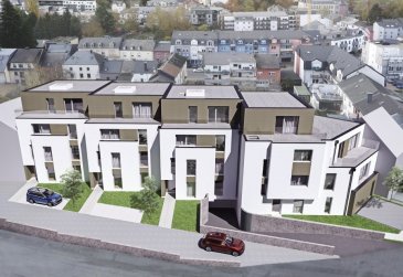Appartement B1
Appartement d'une surface de +ou- 95m2 situé au rez-de-Chaussée avec une terrasse de +ou- 6.55m2 et un jardin privatif de +ou- 100m2.

L'appartement dispose de deux chambres à coucher de 15.02m2 et 10.93m2, une salle de bains, un dressing, un Wc séparé et une cave privative.

Vous pourrez acquérir un emplacement intérieur au prix de 30.000,00€ ou un emplacement extérieur au prix de 15.000,00€.

Le projet comprend 6 nouvelles résidences à toitures plates de style contemporain dans une rue calme et sans issue dans la ville de Tétange.

Les 6 résidences regroupent 16 logements en tout.

4 Résidences ont chacune 2 appartements et 1 penthouse sur deux niveaux par bâtiment, le sous-sol est commun aux 4 bâtiments. Les 4 résidences comprennent 24 emplacements intérieurs et 2 emplacements extérieurs.

Les 2 autres bâtiments ont 2 duplex chacun avec un sous-sol séparé pour les deux bâtiments qui disposent de 4 caves et de 4 emplacements intérieurs doubles.
Les 4 duplex auront des entrées complètement séparés comme dans une maison.

Chaque appartement dispose d'une cave privé.
Les appartements sont spacieux et lumineux disposant de 2 à 4 chambres à coucher avec une voir 2 terrasses par appartements.

Les appartements situés au rez - de - chaussée dispose d'un jardin privé.

Chaque détail a été ici pensé afin de proposer aux futurs occupants un confort de vie optimal.
Des équipements et matériaux haut de gamme sélectionnés avec le plus grand soin, des espaces extérieurs comme des terrasses et jardins privés pour les appartements au rez-de-chaussée et des terrasses avec une vue dégagée pour les biens aux étages supérieurs .