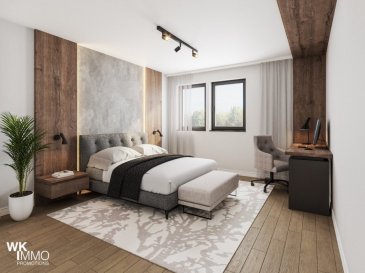 Découvrez cet appartement lumineux et moderne situé au 2e étage d'un des trois nouveaux bâtiments d'une magnifique résidence verdoyante, à vendre par WK IMMO Promotions.

Cette résidence en cours de construction vous offre une qualité de vie incomparable. Idéalement situé à Junglinster, dans un quartier calme et recherché, cet appartement combine confort, design et espace. Il est parfait pour une famille ou des professionnels à la recherche d'un cadre de vie agréable.

Caractéristiques principales :

- Une surface totale de 124 m²  
- Un joli séjour de 41 m² avec une cuisine ouverte moderne donnant sur un balcon de 16 m²
- Une chambre parentale/principale avec son dressing et salle de bain privative
- 2 chambres pouvant servir de bureau ou chambre à coucher
- Une salle de bain principale avec douche
- Un WC séparé  
- Un débarras pour rangement supplémentaire 

Emplacement :

Cet appartement se trouve dans un quartier calme et recherché, à proximité des transports en commun, des commerces, écoles, parcs et restaurants. Un emplacement idéal pour une vie pratique et agréable au quotidien.

Points forts :

- Emplacement central
- Appartement très lumineux grâce à ses grandes fenêtres
- Dressing pour la chambre principale
- Un débarras au sous-sol et une buanderie commune pour plus de praticité
- Nouvelle construction dans un cadre paisible et verdoyant 
- Idéal pour une première acquisition ou un investissement locatif

Ce bien rare ne restera pas longtemps sur le marché ! N'attendez plus pour visiter et découvrir votre futur chez-vous.

Pour plus d'informations ou pour organiser une visite, contactez WK IMMO Promotions au 621 686 850 ou par e-mail à contact@wki.lu ou m.djurovic@wki.lu