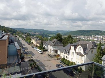 Bel appartement de 76,78m² à vendre à Wiltz;

L'appartement situé au 4ème étage avec ascenseur se compose de:
- beau hall d'entrée
- séjour / salle à manger avec coin cuisine équipée, sortie sur terrasse
- salle de bain avec douche, lavabo
- wc séparé
- 2 belles chambres à coucher, sortie sur terrasse
- double emplacement intérieur avec cave.

Belle terrasse de 40,30m² accès via séjour / salle à manger et les 2 chambres.

