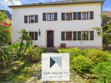 Magnifique ferme de 1829, entièrement rénovée avec passion durant les dernières années, qui est érigée sur le terrain de 8a34ca et qui dispose d'une surface habitable de ± 303 m² pour une surface totale ± 446 m². Les propriétaires ont eu le bon goût de garder des éléments d'époque en modernisant la maison et la grange attenante. Le portail électrique s'ouvre sur la partie cour et jardin communiquant avec la grange d'un côté et de l'autre avec la maison principale, laquelle se compose comme suit :

Le rez-de-chaussée :

Le hall d'entrée dessert un premier salon/salle à manger de ± 16m², un salon principal sur deux niveaux de ± 42m² avec une mezzanine de ± 27m², une cuisine séparée et équipée de ± 18m² avec un cellier de ± 12m², une salle de douche de ± 8 m² et un débarras.

Le premier étage :

Un hall de nuit de ± 8 m² mène vers 3 chambres de ± 15, 16 et 20 m² ainsi qu'une salle de bain de ± 11 m².

Les combles récemment aménagés et rehaussés forment un magnifique espace ouvert avec une hauteur sous plafond de 4,5 m. S'y trouvent actuellement une suite parentale avec un coin bureau, une salle de bain et un dressing, le tout de ± 92 m².

La grange attenante dispose d'une surface totale de ± 143 m² répartie comme suit: un garage de ± 93 m², ainsi que 2 pièces multifonctionelles de ± 25 et 26 m². Elle est aujourd'hui utilisée comme garage, espace hobby, chaufferie et buanderie.

Visite virtuelle sur demande. 

Généralités :

- Bien rare;
- Maison entièrement rénovée;
- Situation calme, près de la nature;
- Plusieurs possibilités d'aménagement et d'exploitation;
- Propriété rare et protégée avec tout le confort, prête à accueillir immédiatement une famille.

Agent responsable : Katia Gravière au 661 33 29 82 ou katia@vanmaurits.lu