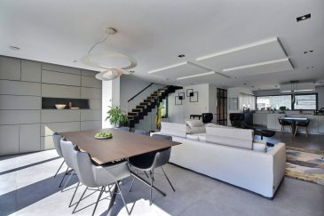 Contactez-le +352 621 323 867 pour cette annonce. 

Maison d'exception située dans une cité résidentielle très prisée à Olm (commune de Kehlen), au calme d'une impasse, à proximité de Capellen et Mamer.
Cette maison contemporaine achevée en 2019 allie esthétique, confort moderne et performance énergétique. Elle offre des prestations premium, un jardin aménagé, une salle de fitness et pas moins de cinq emplacements de stationnement. 


Caractéristiques générales :
Maison (construction achevée en 2019) 
Passeport énergétique : classe A-B
Surface généreuse, finitions haut de gamme 
Jardin clôturé avec terrasse plein sud-ouest 


Technologie et confort :
Pompe à chaleur combinée à des panneaux solaires thermiques pour le chauffage de l'eau 
Installation photovoltaïque de 6,5 kW pour la production électrique en autoconsommation 
Chauffage au sol sur toute la surface habitable 
Triple vitrage pour un confort thermique et acoustique optimal 
Ventilation mécanique double flux avec récupération de chaleur 
Domotique KNX avec luminaires intégrés dans les plafonds design haut de gamme 
Système audiovisuel (AV) connecté pour une expérience multimédia intégrée 


 Disposition des espaces : 
Rez-de-jardin - Espace de vie: 
Hall d'entrée avec placard & WC séparé 
Grand séjour lumineux avec espace salle à manger 
Cuisine ouverte entièrement équipée (électroménagers de marque Miele) 
Accès direct à la terrasse et au jardin 

Étage supérieur 
Espace nuit : Trois chambres à coucher, dont une master suite avec dressing sur mesure et salle de bain privative 
Salle de bain supplémentaire avec douche à l'italienne 

Sous-sol entièrement aménagé : 
Salle de fitness privée 
Local technique Buanderie et espace de rangement 


Stationnement 
emplacements privés Garage fermé (2 voitures côte à côte) 
2 emplacements extérieurs devant la maison 
2 emplacements supplémentaires devant le garage 
Total : 6 emplacements de stationnement (intérieurs et extérieurs) 


Atouts supplémentaires : 
Environnement calme, verdoyant et sécurisé 
Proche des commodités, écoles et transports 
Maison connectée, écologique et économique à l'usage 
N'hésitez pas à nous joindre pour plus de renseignements.