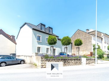 Située au centre du Village de Mensdorf, cette maison/fermette entièrement rénovée avec un intérieur contemporain style loft dispose d'une surface habitable de ± 276 m² pour une surface totale de ± 299 m². Elle se compose comme suit :

Le rez-de-chaussée, comprend un hall d'entrée de ± 6 m² avec un vestiaire de ± 2 m², une salle à manger / séjour de ± 16 m² avec un poêle à éthanol donnant sur une cuisine, contemporaine ouverte équipée et aménagée de ± 25 m² avec un îlot central flottant avec sol en béton ciré (incluant la cage d'escaliers) et de grandes baies vitrées donnant sur la terrasse de ± 41 m² et le jardin orienté ouest.

La partie grange entièrement modernisée et lumineuse, avec un haut plafond de ± 5 m est divisé en un espace showroom/living de ± 109 m², porte d'entrée de 3 m de hauteur. Un studio indépendant (actuellement wine-bar) de ± 22 m² avec une kitchenette équipée donne accès par une baie vitrée à une terrasse de 28 m², une salle de douche de ± 6 m² (douche Italienne, lavabo, wc), et en mezzanine une chambre de ± 8 m².

Le 1er étage est composé de la cage d'escalier de ± 9 m² qui dessert une chambre parentale de ± 26 m² ainsi qu'une salle de douche de ± 13 m² (douche Italienne, lavabo, wc, chauffe-serviettes) incluant la buanderie et accès au balcon de ± 6 m².

Le 2ème étage sous les combles est aménagé en grenier/salon/bureau de ± 31m² (possibilité de faire 2 chambres) avec accès à une terrasse de ± 5 m².

Le sous-sol comprend deux caves de ± 7 et 16 m².

Le jardin clôturé de ± 250 m² et 3 emplacements de parking extérieur devant la maison complètent l'offre.

Généralités :
- Chauffage au gaz par le sol
- Fenêtres triple vitrage sur châssis bois, volets électriques
- 2 Cheminées à l'éthanol
- Certificat énergétique D ? E
- garage-showroom de ± 109 m² pouvant exposer ± 6 voitures ou être utilisé comme living/salon

Agent responsable: Maurits van Rijckevorsel - maurits@vanmaurits.lu  
GSM 621 198 891