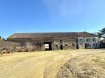 Corps de ferme .  Ensemble immobilier comprenant une maison d'habitation de 300 m2, une écurie avec grange de 300 m2 ainsi qu'un hangar de 1 500 m2, le tout implanté sur une parcelle de 11 100 m2.