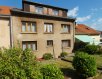 Maison Vente à Algrange - 219 000 € Maison - 10 pièces - 280m2. Idéal famille nombreuse !Dans un environnement agréable, proche des écoles et des commerces.Maison unifamiliale sur 4 niveaux comprenant :- en Rez de Chaussée (surélevé) : 2 pièces pouvant être aménagées en F1, ainsi qu'une buanderie / chaufferie donnant accès au jardin clos et arboré- Le 1er niveau est configuré tel un appartement F3 comprenant 1 cuisine, 1 séjour, 2 chambres, 1 salle de bain et wc séparés- Le second niveau est actuellement composé d'1 cuisine, 1 séjour, 3 chambres et 1 wc sur le palier- Enfin, le dernier niveau vous propose 3 chambres et un grenier.La construction date de 1956, dalle béton sur tous les niveaux.DV sur une partie de la maison.Chauffage gaz (y compris au sous-sol), chaudière fonctionnelle.En plus du jardin d'environ 1.25 ares situé à l'arrière, la maison dispose également d'une terrasse de 40m2 sur l'avant, surplombant ses 2 garages.Frais d'agence inclus, à la charge du vendeur.Véronique GONZALEZ03 82 84 17 98