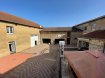 Maison Vente 5 chambres à Koenigsmacker - 598 000 € KOENIGSMACKER - Un ensemble immobilier - 598 000€. GROS POTENTIEL ! A 15 km de la frontière Luxembourgeoise et Allemande, à découvrir une belle rénovation d'un ancien corps de ferme, avec son porche qui vous accueille dans sa cour intérieure et qui dessert les bâtiments suivants: - Une maison de 165 m² composée d'un rez-de-chaussée avec un salon séjour, une cuisine équipée et meublée qui offre accès à la terrasse, un w-c et le 1er étage nous emmène aux 3 chambres dont une suite parentale avec sa salle d'eau et son dressing, une salle de bain et des combles aménageables de 80m², une belle cave à vin.- Le 2nd bâtiment de 180 m², au rez-de-chaussée une chambre, une buanderie, une cuisine entièrement équipée et meublée, une salle de bain, et à l'étage un grand salon avec accès balcon et une grande chambre de 30 m² . - Une dépendance à rénover de 150 m² ainsi que la grande grange avec atelier de 280 m² et le terrain à l'arrière complètent ce bien cadastré sur 19 ares de terrain Prix frais d'agence inclus charge vendeur: 598 000€