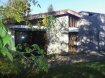 Maison Vente à Vagney - 320 000 € Maison comprenant : entrée, salon-séjour avec cheminée, véranda, cuisine équipée, 2 chambres, salle de douche - WC, en duplex : 2 chambres, salle de douche - WC. de l'autre côté : entrée, bureau, 2 pièces, WC, cave, garage, chaufferie, bucher. Terrain attenant de 1 000m² environ Prix : 320 000 * *Dont Honoraires % TTC à la charge de l'acquéreur calculés sur la base du prix net vendeur Prix hors honoraires :