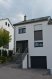 Maison jumelée Vente 4 chambres à Schieren - Prix sur demande FIS Immo est fière de vous présenter une maison jumelée de haut standing, d'une très haute finition, construction très récente, située dans un quartier calme et agréable de Schieren.
*) Au rez-de-chaussée on trouve un hall d'entrée avec WC séparé, un placard fait sur mesure qui sert de dressing, un grand living de 60 m2 et une cuisine équipée et séparée de 15 m2. Du living on a accès à la terrasse de 20 m2 ainsi que sur le jardin avec son petit chalet en bois.
*) Au premier étage on trouve de nouveau un grand placard qui sert de dressing et 3 chambres à coucher dont 2 chambres ont accès à une autre terrasse de 20m2 avec une vue magnifique. En plus, on trouve une salle de bain très luxurieux avec douche italienne, meubles et un jacuzzi.
*) Au deuxième étage on trouve un living ainsi qu'un coin pour aménager une petite cuisine, ainsi qu'une chambre à coucher. On y trouve également une salle de bain avec douche. Sur cet étage il y a quatre Velux qu'on peut diriger avec télécommande.
*) Au sous-sol il y a un garage pour deux voitures ainsi qu'un emplacement pour vélos, motos etc. Au sous-sol on trouve également une petite salle de fitness ainsi qu'un bureau de 20 m2. Il y a également une buanderie avec douche ainsi qu'une salle de chauffage à gaz.
Vu la construction récente de cet objet, il reste encore 8 ans de garantie du constructeur ainsi de même sur l'installation de chauffage.
N'hésitez pas de nous contacter si vous avez des questions supplémentaires ( Tel 00352/621278925 )