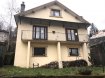 Maison Vente à Plombières-les-Bains - 140 000 € Une maison comprenant au rez-de-chaussée: entrée, cuisine équipée, séjour, salon, cheminée, salle de douche, WC, une chambre, 1er étage: deux chambre dressing. Sous-sol: buanderie, cave, atelier, remise bois. chauffage GAZ convecteurs électriques.