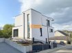 Maison Vente 3 chambres à Schouweiler - 1 360 000 € Belle maison d'une architecture moderne construite sur un terrain de 3a21ca. La maison dispose d'une surface totale 185,96m2 se compose de:Rez-de-chaussée:Hall d'entrée, garage pour 2 voitures, cave, chaufferie et salle de douche/buanderie.Etage1:Grand living/salle à manger avec cuisine ouverte équipée donnant accès à la terrasse et au jardin (Ouest), débarras et WC séparé.Etage 2:Palier, 3 chambres-à-coucher et 1 salle de bain + WC.Prix affiché avec 3% de TVA inclus. La cuisine sera facturée séparement à 20.000 euros