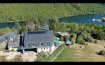Maison Vente 5 chambres à Bonnal - 2 300 000 € Texte français and english ci-dessous.
Eines der traumhaftesten Anwesen im Luxemburger Land.
Auf einer Anhöhe, direkt über dem Stausee und grandiosem Rundumblick, liegt das Anwesen sehr ruhig und mitten in der Natur. Nur ein kleiner Weg führt zu der handvoll, exklusiven Häuser, in einer sehr bevorzugten Lage.
Das Haupthaus wurde 1960 im Ardennen-Stil errichtet, vom jetzigen Eigentümer von Grund auf erneuert und mit einem 450m2 großen, modernen Anbau erweitert. Somit stehen insgesamt fast 517m2 Wohnfläche zur Verfügung und eine riesige Garage für mindestens 4 Autos.
Das ursprüngliche Haus wurde komplett erneuert, wobei der klassische Ardennen-Stil berücksichtigt blieb. Es wurden nur die besten Materialien verwendet und gerade im Detail keinerlei Kosten gescheut. So entstand im unteren Bereich ein großzügiges Wohn/Esszimmer mit Zugang zur wunderschönen, riesigen Terrasse mit Seeblick. Die Küche ist funktionell/modern und mit einer Durchreiche mit dem Esszimmer verbunden. Des Weiteren gibt es eine Gäste-Toilette und eine klassische Treppe in den ersten Stock. Dort liegt das Master-Schlafzimmer mit Balkon (Traumblick), eigenem Traum-Bad und Dressing. Daneben gibt es ein weiteres Zimmer mit Schlafzimmer im Stock darüber. Hier gibt es einen Zugang zur Sonnenbank. Weiterhin findet man ein Abstellzimmer, ein Bad, eine separate Toilette und ein gemütliches Zimmer, dass als Büro genutzt werden kann. Hier liegt auch der Zugang zum neuen Teil des Anwesens. Man betritt einen Raum von ca 70m2, mit 4 großen Fenstern und einem weiteren, offenen Stockwerk, welches nochmals 25m2 umfasst. Im hinteren Teil gelangt man über eine Glas-Schiebetür in einen modernen Dressing und ein sehr modernes Bad mit Dusche und Toilette. Dieser großzügige Bereich eignet sich zum sehr komfortablen Wohnen, als Büro oder seriösen Hobby-Raum. Eine weitere Tür öffnet den rechten Flügel des Anwesens. Hier liegen ein großer Raum mit Kamin und tollen, burgähnlichen Fenstern, sowie ein weiterer großer Raum mit Badezimmer. Man kann diesen Bereich auch getrennt vom Haupthaus, von der Garagenseite erreichen. Eine weitere Treppe führt in den 2.Stock des rechten Flügels und bietet ein wahnsinniges Turmzimmer mit einem 2.Bereich, der als Abstellkammer oder Archiv genutzt werden kann. Von hier hat man einen unglaublichen Blick über den Stausee und die gesamte Natur. Diese Räumlichkeiten des rechten Flügels können als eigenständige Wohnung oder als Büro genutzt werden. Im Erdgeschoss dieser Seite des Anwesens befinden sich die riesige Garage für mindestens 4 Autos, einer Werkstatt, ein Badezimmer mit Dusche und die super-moderne Gas-Heizungsanlage. Eine Regenwasseranlage ist vorinstalliert.
Alle verbauten Materialien sind sehr hochwertig, alle Holzarbeiten, Kacheln, Marmor und Steingut, Fenster ( im neuen Teil 3-4 fach ), Fliegengitter, Schieferdächer, Isolierungen, Alarmanlage, Garagentore etc.
Auf die Außenanlage des Anwesens wurde besondere Rücksicht genommen. Über einen eigenen Weg gelangt man auf das riesige Grundstück mit stilgerechter Vorfahrt vor dem Haus. Der vordere Teil des Anwesens wurde mit viel Liebe zum Detail angelegt und begeistert alle Besucher. Eine riesige Durchfahrt vor den Garagen stellt eine praktische Verbindung zur Terrasse und Garten dar oder sorgt dafür, dass man bei jedem Wetter trocken ins Haus kommt, ohne die Garage benützen zu müssen. Der Eingangsbereich des ursprünglichen Hauses wurde nach toskanischem Vorbild ausgebaut mit einer romanischen Pergola mit Platz für viele Freunde und einem eigens gebauten Backofen/Grill Häuschen. Hier lassen sich die Sommertage wie in Italien verbringen. Eine weitere, riesige Terrasse befindet sich hinter dem Anwesen und lässt sich , unter anderem, vom Wohnzimmer her betreten. Hier wurde sehr stilvoll mit vielen Steinen gearbeitet, mehrere luxuriöse Aufenthaltsmöglichkeiten erschaffen, sowie eine traumhafte Gartenlandschaft gestaltet. Verrückte Details sind 2 Außenkamine, Lampen in verschiedenen Nischen und viele verrückte Accessoires an den Wänden und im Garten. Hier finden sich weitere kleinere Gebäude, wie zum Beispiel eine Holz-Chalet (30m2), ein großer Hundezwinger, ein Abstellhäuschen für Gartengeräte, und ein professionelle Umweltkontainer.
Das Grundstück verläuft sich auf der rechten Site des Anwesens in einem riesigen, zum Teil angelegten ,Park mit eigenem Zugang von der unteren Straße. Hier gibt es wiederum mehrere kleine Holzschuppen, eine Werkstatt und die Möglichkeit ein großes, weiteres Gebäude zu errichten. ( z.B. einen großen Pferdestall für mehrere Tiere, eine große Werkstatt oder einfach nur eine Halle für verschiedene Möglichkeiten). Das gesamte Anwesen ist eingezäunt.
Das Anwesen ist einzigartig in der Lage, Größe und Qualität, was heutzutage kaum noch realisierbar sein wird. Umgeben von weiteren Traumhäusern und prominenter Nachbarschaft, lässt sich Natur und die absolute Ruhe genießen.
Insenborn liegt malerisch am Stausee von Luxemburg, mitten in der Natur. Der See bietet viele Wassersportmöglichkeiten und der Strand von Insenborn ist in ein paar Minuten erreichbar. Das Städtchen Esch/Sur liegt nur einige Kilometer entfernt. Arlon (B) befindet sich 20 Minuten auf der anderen Seite des Sees, sowie eine Autobahnanbindung Luxemburg-Brüssel. Die Verbindung zur Stadt Luxemburg wurde durch die Eröffnung des Stafelter Tunnels noch einfacher. Den Kirchberg/Flughafen erreicht man in etwa 40 Minuten.
Une des plus belles propriétés de rêve au Luxembourg.
La propriété a une situation très tranquille sur un coteau en pleine nature, directement au-dessus du lac de barrage et offrant une vue panoramique grandiose. Seulement quelques maisons exclusives en situation très privilégiée sont accessibles par un seul petit chemin.
La maison principale de style ardennais, a été érigée en 1960. Elle a été rénovée de fond en comble par le propriétaire actuel et elle a été agrandie d’une annexe moderne de 450m2. Par conséquent, presque 517m2 de surface habitable, ainsi qu’un garage gigantesque pour au moins 4 voitures sont à disposition.
Lors de la rénovation complète de la maison initiale, le style classique ardennais a été respecté. Seulement les meilleurs matériaux ont été utilisés et, surtout en détail, on y a mis le prix. Il en résulte dans la partie inférieure, un salon/salle à manger spacieux avec accès sur la terrasse magnifique et gigantesque avec vue sur lac. La cuisine est fonctionnelle et moderne et est reliée par un passe-plat à la salle à manger. En outre, on a un WC séparé et un escalier classique pour atteindre le premier étage où se situe la chambre à coucher principale avec balcon et vue de rêve, ainsi qu’un dressing et une salle de bains de rêve. A côté, on trouve une pièce supplémentaire avec chambre à coucher au-dessus. Ici on a accès au solarium. En outre, cet étage est équipée d’ un débarras, d’une salle de bains, d’un WC séparé et d’une chambre douillette, qui peut avoir l’affectation de bureau. Ici se trouve l’accès à la nouvelle partie de la propriété. On entre dans une pièce de +/- 70m2, équipée de 4 grandes fenêtres et d’un étage ouvert supplémentaire, qui englobe encore une fois 25m2. Dans la partie postérieure, on accède par le biais d’une porte coulissante en verre à un dressing moderne et une salle de bains moderne avec douche et WC. Cette partie généreuse s’apprête particulièrement comme séjour confortable, comme bureau ou comme spacieuse pièce à hobby. Une porte supplémentaire ouvre l’aile droite de la propriété où se situe une grande pièce avec cheminée équipée de fenêtres dans le style d’un château-fort, ainsi qu’une autre grande pièce avec salle de bains. Toute cette partie peut également être accédée séparément à partir du côté du garage. Un escalier supplémentaire mène au 2me étage de l’aile droite et offre une chambre-tour délirante avec une 2me partie, qui peut être utilisée comme archive ou débarras. D’ici, on a une vue incroyable sur la nature et le lac. Ces locaux de l’aile droite peuvent être exploités comme bureau, ou comme appartement séparé. Au rez- de- chaussée de ce côté de la propriété se situe l’énorme garage pour au moins 4 voitures, un atelier, une salle de douche et le chauffage au gaz super-moderne. Une installation de récupération des eaux pluviales est préinstallée. Tous les matériaux de construction, comme la menuiserie, le carrelage, marbre, fenêtres (dans la nouvelle partie à triple et quadruple vitrage),Moustiquaires, isolations, installation d’alarme, portes de garage etc., sont de très haute qualité.
Les alentours de la propriété ont été pris particulièrement en considération. Par le biais d’un chemin privé, on atteint le terrain gigantesque avec arrêt de style devant la maison. La partie antérieur de la propriété a été aménagée avec beaucoup d’amour au détails et enthousiasme tous les visiteurs. Le passage gigantesque devant les garages constitue un raccordement pratique avec la terrasse et la jardin, de sorte qu’on peut atteindre la maison par tous les temps sans devoir utiliser le garage.
La partie d’entrée de la maison initiale a été aménagé selon le modèle toscane avec une pergola romantique, une maison à barbecue avec four, pour avoir beaucoup d’espace pour les invités. Les journées d’été se passent comme en Italie. Une autre terrasse gigantesque se situe dans la partie postérieure de l’immeuble et peut être atteinte entre autres à partir du living. On a travaillé beaucoup de pierres, crée plusieurs possibilités luxurieuses de séjour et dessiné un jardin de rêve.
En détail, on trouve 2 cheminées extérieures, des lampes dans diverses niches et beaucoup d’accessoires délirants sur les murs et au jardin. Plusieurs petites bâtisses se trouvent ici, comme un chalet en bois de 30 m2, un chenil, un abri de jardin pour outils et un conteneur environnemental professionnel.
Le terrain se perd du côté droit en un parc énorme en partie aménagé avec accès séparé de la rue inférieure. On y trouve encore plusieurs remises en bois, un atelier et la possibilité d’ériger un grand immeuble supplémentaire. (p.ex. écurie pour plusieurs chevaux, un hall ou un atelier) Toute la propriété est clôturée.
Cette propriété est unique depuis sa situation, sa surface et sa qualité, dont la réalisation nos jours ne semble pratiquement plus possible. Entouré d’autres villas de rêve et voisinage élitaire, la nature et le calme absolu peuvent être savourés.
Insenborn se situe de façon pittoresque en pleine nature au bord du lac de barrage au Luxembourg. Le lac offre beaucoup de possibilités de sports nautiques et la plage d'Insenborn est à quelques minutes. Le petite ville d'Esch- sur- Sûre n'est qu'à quelques kilomètres. Arlon se situe à 20 minutes de l'autre côté du lac, ainsi qu'un accès sur l'autoroute Luxembourg - Bruxelles. Le trajet vers Luxembourg, Kirchberg et l'aéroport va considérablement s'améliorer avec l'ouverture de la route du nord .
One of the most fantastic properties in the Luxembourg region.
On a hill, directly above the lake and with a grandiose all-round view, the property is very quiet and in the middle of nature. Only a short walk leads to the handful of exclusive houses in a very privileged location.
The main house was built in 1960 in the Ardennes style, completely renovated by the current owner and expanded with a 450m2 modern extension. Thus, a total of almost 517m2 of living space is available and a huge garage for at least 4 cars.
The original house has been completely renovated, keeping the classic Ardennes style in mind. Only the best materials were used and no expense was spared, especially in the details. This created a spacious living / dining room in the lower area with access to the wonderful, huge terrace with a view of the lake. The kitchen is functional / modern and connected to the dining room with a hatch. Here you find also a guest toilet and a classic staircase to the first floor with the master bedroom with balcony (dream view), own bathroom and dressing, another room with a bedroom on the floor above plus access to the sunbed here. There is also a storage room, a bathroom, a separate toilet and a cozy room that can be used as an office. Here you find the access to the new part of the property. You enter a room of approx. 70m2, with 4 large windows and another, open floor, which comprises another 25m2. A sliding glass door in the rear part leads to a modern dressing room and a modern bathroom with shower and toilet. This spacious area is suitable for very comfortable living, as an office or a serious hobby room. Another door opens the right wing of the property. Here is a large room with a fireplace and great, castle-like windows, as well as another large room with a bathroom. You can also reach this area separately from the main house, from the garage side. Another staircase leads to the 2nd floor of the right wing and offers an insane tower room with seperate room that can be used as a storage room or archive. From here you have an incredible view of the lake and all of nature. These rooms in the right wing can be used as an independent apartment or as an office. On the ground floor of this side of the property you will find the huge garage for at least 4 cars, a workshop, a bathroom with shower and the ultra-modern gas heating system. A rainwater system is pre-installed and solar panels on the roof.
All built-in materials are of very high quality, all woodwork, tiles, marble and earthenware, windows (3-4 fold in the new part), fly screens, slate roofs, insulation, alarm systems, garage doors etc.
Special consideration was given to the grounds of the property. A separate path leads to the huge property with a stylish right of way in front of the house. The front part of the property was laid out with great attention to detail and inspires all visitors. A huge passage in front of the garages provides a practical connection to the terrace and garden or ensures that you can get into the house dry in any weather without having to use the garage. The entrance area of ??the original house was expanded according to the Tuscan model with a Romanesque pergola with space for many friends and a specially built oven / grill house. Here you can spend the summer days like in Italy. Another, huge terrace is located behind the property and can be entered, among other things, from the living room. A lot of stones were used here in a very stylish way, several luxurious accommodation options were created and a wonderful garden landscape was designed. Crazy details are 2 outdoor fireplaces, lamps in different niches and lots of crazy accessories on the walls and in the garden. There are other smaller buildings here, such as a wooden chalet (30m2), a large dog kennel, a box for gardening tools and a professional environmental container.
The property runs on the right side of the property in a huge, partly landscaped park with its own access from the lower street. There are several small wooden sheds, a workshop and the possibility of building another large building. (e.g. a large horse stable for several animals, a large workshop or just a hall for various possibilities). The entire property is fenced.
The property is unique in its location, size and quality, which will hardly be feasible these days. Surrounded by other dream houses and prominent neighborhoods, you can enjoy nature and the absolute tranquility.
Insenborn is picturesquely located on the Luxembourg lake, in the middle of nature. The lake offers many water sports and the beach von Insenborn can be reached in a few minutes. The town of Esch / Sur is only a few kilometers away. Arlon (B) is 20 minutes on the other side of the lake, as well as a motorway connection Luxembourg-Brussels. The connection to Luxembourg City became even easier with the opening of the Stafelter Tunnel. The Kirchberg / airport can be reached in about 40 minutes.