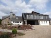 Maison de maître Vente 5 chambres à Insenborn - 2 200 000 € Texte français ci-dessous.
Eines der traumhaftesten Anwesen im Luxemburger Land.
Auf einer Anhöhe, direkt über dem Stausee und grandiosem Rundumblick, liegt das Anwesen sehr ruhig und mitten in der Natur. Nur ein kleiner Weg führt zu der handvoll, exklusiven Häuser, in einer sehr bevorzugten Lage.
Das Haupthaus wurde 1960 im Ardennen-Stil errichtet, vom jetzigen Eigentümer von Grund auf erneuert und mit einem 450m2 großen, modernen Anbau erweitert. Somit stehen insgesamt fast 517m2 Wohnfläche zur Verfügung und eine riesige Garage für mindestens 4 Autos.
Das ursprüngliche Haus wurde komplett erneuert, wobei der klassische Ardennen-Stil berücksichtigt blieb. Es wurden nur die besten Materialien verwendet und gerade im Detail keinerlei Kosten gescheut. So entstand im unteren Bereich ein großzügiges Wohn/Esszimmer mit Zugang zur wunderschönen, riesigen Terrasse mit Seeblick. Die Küche ist funktionell/modern und mit einer Durchreiche mit dem Esszimmer verbunden. Des Weiteren gibt es eine Gäste-Toilette und eine klassische Treppe in den ersten Stock. Dort liegt das Master-Schlafzimmer mit Balkon (Traumblick), eigenem Traum-Bad und Dressing. Daneben gibt es ein weiteres Zimmer mit Schlafzimmer im Stock darüber. Hier gibt es einen Zugang zur Sonnenbank. Weiterhin findet man ein Abstellzimmer, ein Bad, eine separate Toilette und ein gemütliches Zimmer, dass als Büro genutzt werden kann. Hier liegt auch der Zugang zum neuen Teil des Anwesens. Man betritt einen Raum von ca 70m2, mit 4 großen Fenstern und einem weiteren, offenen Stockwerk, welches nochmals 25m2 umfasst. Im hinteren Teil gelangt man über eine Glas-Schiebetür in einen modernen Dressing und ein sehr modernes Bad mit Dusche und Toilette. Dieser großzügige Bereich eignet sich zum sehr komfortablen Wohnen, als Büro oder seriösen Hobby-Raum. Eine weitere Tür öffnet den rechten Flügel des Anwesens. Hier liegen ein großer Raum mit Kamin und tollen, burgähnlichen Fenstern, sowie ein weiterer großer Raum mit Badezimmer. Man kann diesen Bereich auch getrennt vom Haupthaus, von der Garagenseite erreichen. Eine weitere Treppe führt in den 2.Stock des rechten Flügels und bietet ein wahnsinniges Turmzimmer mit einem 2.Bereich, der als Abstellkammer oder Archiv genutzt werden kann. Von hier hat man einen unglaublichen Blick über den Stausee und die gesamte Natur. Diese Räumlichkeiten des rechten Flügels können als eigenständige Wohnung oder als Büro genutzt werden. Im Erdgeschoss dieser Seite des Anwesens befinden sich die riesige Garage für mindestens 4 Autos, einer Werkstatt, ein Badezimmer mit Dusche und die super-moderne Gas-Heizungsanlage. Eine Regenwasseranlage ist vorinstalliert.
Alle verbauten Materialien sind sehr hochwertig, alle Holzarbeiten, Kacheln, Marmor und Steingut, Fenster ( im neuen Teil 3-4 fach ), Fliegengitter, Schieferdächer, Isolierungen, Alarmanlage, Garagentore etc.
Auf die Außenanlage des Anwesens wurde besondere Rücksicht genommen. Über einen eigenen Weg gelangt man auf das riesige Grundstück mit stilgerechter Vorfahrt vor dem Haus. Der vordere Teil des Anwesens wurde mit viel Liebe zum Detail angelegt und begeistert alle Besucher. Eine riesige Durchfahrt vor den Garagen stellt eine praktische Verbindung zur Terrasse und Garten dar oder sorgt dafür, dass man bei jedem Wetter trocken ins Haus kommt, ohne die Garage benützen zu müssen. Der Eingangsbereich des ursprünglichen Hauses wurde nach toskanischem Vorbild ausgebaut mit einer romanischen Pergola mit Platz für viele Freunde und einem eigens gebauten Backofen/Grill Häuschen. Hier lassen sich die Sommertage wie in Italien verbringen. Eine weitere, riesige Terrasse befindet sich hinter dem Anwesen und lässt sich , unter anderem, vom Wohnzimmer her betreten. Hier wurde sehr stilvoll mit vielen Steinen gearbeitet, mehrere luxuriöse Aufenthaltsmöglichkeiten erschaffen, sowie eine traumhafte Gartenlandschaft gestaltet. Verrückte Details sind 2 Außenkamine, Lampen in verschiedenen Nischen und viele verrückte Accessoires an den Wänden und im Garten. Hier finden sich weitere kleinere Gebäude, wie zum Beispiel eine Holz-Chalet (30m2), ein großer Hundezwinger, ein Abstellhäuschen für Gartengeräte, und ein professionelle Umweltkontainer.
Das Grundstück verläuft sich auf der rechten Site des Anwesens in einem riesigen, zum Teil angelegten ,Park mit eigenem Zugang von der unteren Straße. Hier gibt es wiederum mehrere kleine Holzschuppen, eine Werkstatt und die Möglichkeit ein großes, weiteres Gebäude zu errichten. ( z.B. einen großen Pferdestall für mehrere Tiere, eine große Werkstatt oder einfach nur eine Halle für verschiedene Möglichkeiten). Das gesamte Anwesen ist eingezäunt.
Das Anwesen ist einzigartig in der Lage, Größe und Qualität, was heutzutage kaum noch realisierbar sein wird. Umgeben von weiteren Traumhäusern und prominenter Nachbarschaft, lässt sich Natur und die absolute Ruhe genießen.
Insenborn liegt malerisch am Stausee von Luxemburg, mitten in der Natur. Der See bietet viele Wassersportmöglichkeiten und der Strand von Insenborn ist in ein paar Minuten erreichbar. Das Städtchen Esch/Sur liegt nur einige Kilometer entfernt. Arlon (B) befindet sich 20 Minuten auf der anderen Seite des Sees, sowie eine Autobahnanbindung Luxemburg-Brüssel. Die Verbindung zur Stadt Luxemburg wurde durch die Eröffnung des Stafelter Tunnels noch einfacher. Den Kirchberg/Flughafen erreicht man in etwa 40 Minuten.
Une des plus belles propriétés de rêve au Luxembourg.
La propriété a une situation très tranquille sur un coteau en pleine nature, directement au-dessus du lac de barrage et offrant une vue panoramique grandiose. Seulement quelques maisons exclusives en situation très privilégiée sont accessibles par un seul petit chemin.
La maison principale de style ardennais, a été érigée en 1960. Elle a été rénovée de fond en comble par le propriétaire actuel et elle a été agrandie d’une annexe moderne de 450m2. Par conséquent, presque 517m2 de surface habitable, ainsi qu’un garage gigantesque pour au moins 4 voitures sont à disposition.
Lors de la rénovation complète de la maison initiale, le style classique ardennais a été respecté. Seulement les meilleurs matériaux ont été utilisés et, surtout en détail, on y a mis le prix. Il en résulte dans la partie inférieure, un salon/salle à manger spacieux avec accès sur la terrasse magnifique et gigantesque avec vue sur lac. La cuisine est fonctionnelle et moderne et est reliée par un passe-plat à la salle à manger. En outre, on a un WC séparé et un escalier classique pour atteindre le premier étage où se situe la chambre à coucher principale avec balcon et vue de rêve, ainsi qu’un dressing et une salle de bains de rêve. A côté, on trouve une pièce supplémentaire avec chambre à coucher au-dessus. Ici on a accès au solarium. En outre, cet étage est équipée d’ un débarras, d’une salle de bains, d’un WC séparé et d’une chambre douillette, qui peut avoir l’affectation de bureau. Ici se trouve l’accès à la nouvelle partie de la propriété. On entre dans une pièce de +/- 70m2, équipée de 4 grandes fenêtres et d’un étage ouvert supplémentaire, qui englobe encore une fois 25m2. Dans la partie postérieure, on accède par le biais d’une porte coulissante en verre à un dressing moderne et une salle de bains moderne avec douche et WC. Cette partie généreuse s’apprête particulièrement comme séjour confortable, comme bureau ou comme spacieuse pièce à hobby. Une porte supplémentaire ouvre l’aile droite de la propriété où se situe une grande pièce avec cheminée équipée de fenêtres dans le style d’un château-fort, ainsi qu’une autre grande pièce avec salle de bains. Toute cette partie peut également être accédée séparément à partir du côté du garage. Un escalier supplémentaire mène au 2me étage de l’aile droite et offre une chambre-tour délirante avec une 2me partie, qui peut être utilisée comme archive ou débarras. D’ici, on a une vue incroyable sur la nature et le lac. Ces locaux de l’aile droite peuvent être exploités comme bureau, ou comme appartement séparé. Au rez- de- chaussée de ce côté de la propriété se situe l’énorme garage pour au moins 4 voitures, un atelier, une salle de douche et le chauffage au gaz super-moderne. Une installation de récupération des eaux pluviales est préinstallée. Tous les matériaux de construction, comme la menuiserie, le carrelage, marbre, fenêtres (dans la nouvelle partie à triple et quadruple vitrage),Moustiquaires, isolations, installation d’alarme, portes de garage etc., sont de très haute qualité.
Les alentours de la propriété ont été pris particulièrement en considération. Par le biais d’un chemin privé, on atteint le terrain gigantesque avec arrêt de style devant la maison. La partie antérieur de la propriété a été aménagée avec beaucoup d’amour au détails et enthousiasme tous les visiteurs. Le passage gigantesque devant les garages constitue un raccordement pratique avec la terrasse et la jardin, de sorte qu’on peut atteindre la maison par tous les temps sans devoir utiliser le garage.
La partie d’entrée de la maison initiale a été aménagé selon le modèle toscane avec une pergola romantique, une maison à barbecue avec four, pour avoir beaucoup d’espace pour les invités. Les journées d’été se passent comme en Italie. Une autre terrasse gigantesque se situe dans la partie postérieure de l’immeuble et peut être atteinte entre autres à partir du living. On a travaillé beaucoup de pierres, crée plusieurs possibilités luxurieuses de séjour et dessiné un jardin de rêve.
En détail, on trouve 2 cheminées extérieures, des lampes dans diverses niches et beaucoup d’accessoires délirants sur les murs et au jardin. Plusieurs petites bâtisses se trouvent ici, comme un chalet en bois de 30 m2, un chenil, un abri de jardin pour outils et un conteneur environnemental professionnel.
Le terrain se perd du côté droit en un parc énorme en partie aménagé avec accès séparé de la rue inférieure. On y trouve encore plusieurs remises en bois, un atelier et la possibilité d’ériger un grand immeuble supplémentaire. (p.ex. écurie pour plusieurs chevaux, un hall ou un atelier) Toute la propriété est clôturée.
Cette propriété est unique depuis sa situation, sa surface et sa qualité, dont la réalisation nos jours ne semble pratiquement plus possible. Entouré d’autres villas de rêve et voisinage élitaire, la nature et le calme absolu peuvent être savourés.
Insenborn se situe de façon pittoresque en pleine nature au bord du lac de barrage au Luxembourg. Le lac offre beaucoup de possibilités de sports nautiques et la plage d'Insenborn est à quelques minutes. Le petite ville d'Esch- sur- Sûre n'est qu'à quelques kilomètres. Arlon se situe à 20 minutes de l'autre côté du lac, ainsi qu'un accès sur l'autoroute Luxembourg - Bruxelles. Le trajet vers Luxembourg, Kirchberg et l'aéroport va considérablement s'améliorer avec l'ouverture de la route du nord .