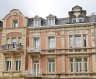 APPARTEMENT 2 CHAMBRES AVEC COMBLES AMÉNAGÉS À ESCH-SUR-ALZETTE

Idéalement situé à Esch-sur-Alzette, cet appartement rénové allie confort de vie, charme et espace complémentaire.

Situé au 3ième étage d'une résidence entretenue, ce bien développe une surface cadastrale de 59,69 m² complétée par 43,20 m² de combles aménagés accessibles directement depuis l'appartement par un escalier intérieur privatif.

Cette configuration permet de bénéficier d'un espace supplémentaire particulièrement appréciable, pouvant être aménagé selon les besoins de chacun : bureau, espace détente, salle de loisirs, dressing ou encore espace de rangement.

L'appartement se compose d'un hall d'entrée, d'un séjour lumineux, d'une cuisine équipée, de deux chambres à coucher ainsi que d'une salle de douche.

Au fil des années, le logement a bénéficié de plusieurs améliorations lui permettant d'être occupé immédiatement sans travaux importants à prévoir.

Parmi ses principaux atouts figurent également la toiture rénovée par la copropriété ainsi que l'installation de quatre Velux apportant une agréable luminosité à l'espace sous toiture.

La résidence est bien entretenue et dispose d'un fonds de travaux. Les charges mensuelles restent particulièrement attractives et s'élèvent à environ 100 € par mois.

Sa situation privilégiée permet un accès rapide aux commerces, écoles, transports en commun ainsi qu'à l'ensemble des commodités du centre-ville.

Cet appartement séduira les acquéreurs à la recherche d'un bien chaleureux et fonctionnel offrant un espace complémentaire rarement disponible dans des biens de surface comparable.

Prix indicatif : 399.000 € Frais d'Agence Inclus.
 
Les surfaces et informations reprises dans cette annonce sont communiquées à titre indicatif et sans valeur contractuelle.

Pour toutes questions ou demandes d'informations, n'hésitez pas à nous contacter, nous serons toujours à votre service.

Agence ELSA'HOME à votre écoute pour la concrétisation de vos projets en toute confiance.

---------------------------------------------------------

2-BEDROOM APARTMENT WITH CONVERTED ATTIC SPACE IN ESCH-SUR-ALZETTE

Ideally located in Esch-sur-Alzette, this renovated apartment combines comfort, charm and additional living space.

Situated on the 3rd floor of a well-maintained residence, the property offers a cadastral surface area of 59.69 sqm, complemented by 43.20 sqm of converted attic space directly accessible from the apartment via a private internal staircase.

This unique layout provides valuable additional space that can be adapted to suit a variety of needs, such as a home office, relaxation area, hobby room, dressing room or storage space.

The apartment comprises an entrance hall, a bright living room, a fitted kitchen, two bedrooms and a shower room.

Over the years, the property has benefited from several improvements, allowing future owners to move in immediately without the need for major renovation works.

Among its key features are the roof renovation carried out by the co-ownership and the installation of four Velux roof windows, bringing plenty of natural light into the attic area.

The residence is well maintained and benefits from a reserve fund. Monthly charges remain particularly attractive at approximately €100 per month.

Its convenient location provides quick access to shops, schools, public transport and all amenities available in the city centre.

This property will appeal to buyers looking for a warm and functional home offering additional space that is rarely found in apartments of a similar size.

Asking Price: €399,000 ? Agency Fees Included.

The surfaces and information contained in this advertisement are provided for information purposes only and are non-contractual.

If you have any questions or require further information, please do not hesitate to contact us. We are always at your service.

ELSA'HOME is here to help you bring your projects to fruition with complete confidence.