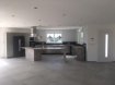 Maison Vente 3 chambres Dogneville - 343 000 € Pavillon de 2019 édifié sur terrain de 900 M2 offrant sur 140 M2 Habitable- cuisine équipée ouverte sur séjour ( 80 M2 )et accès sur grande terrasse- 3 chambres dont une suite parentale avec douche italienne attenante et dressing- 2 autres chambres- deuxième salle de bains avec douche italienne et baignoire balnéo- Garage deux de voitures ( 40 M2) . Aucun travaux à prévoir- garanties décenales-Prix justifié