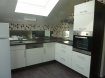 Maison individuelle Vente 3 chambres à Lexy - 310 000 € Dans une maison individuelle, 2 appartements, 1 au rdc Type T4 composé d'une cuisine, salon ouvert sur salle à manger, w-c, salle de bains, 2 chambres, cellier et garage loué 750€, le deuxième au 1er étage Type T2 avec insonorisation au sol composé d'une cuisine, séjour, coin bureau, une chambre, sdb (actuellement non loué volontairement mais l'était à 550€). Sous-sol: chaufferie, buanderie, cave, garage. Terrasse et jardin. Une partie du terrain sur l'arrière est constructible (+- 6 ares) donc possibilité d'acheter l'ensemble et de revendre le terrain à 15000/17000€ l'are. Toiture complète de 2011, Electricité récente, chaudière De Dietrich de 2013, tout à l'égout, porte motorisée de 2016. Taxe foncière: 680€ pour l'ensemble. Gaz au rdv, Elec à l'étage. matériaux de qualité.