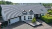 Propriété contemporaine 6 pièces 200 m². Dans un environnement résidentiel calme et recherché, découvrez cette élégante maison contemporaine de 2006, offrant 6 pièces pour environ 200 m² habitables, implantée sur un terrain entièrement clos, paysager et soigneusement entretenu.

Le bien se compose :

- D'un rez-de-chaussée comprenant un hall d'entrée, un vaste espace de vie lumineux réunissant un salon et une salle à manger agrémentés d'une cheminée avec insert, une cuisine ouverte entièrement équipée, une buanderie fonctionnelle, un WC indépendant, une salle de bains avec baignoire, douche à l'italienne et double vasque, ainsi qu'une chambre. Cette configuration permet une véritable vie de plain-pied.

- D'un étage desservi par une spacieuse mezzanine pouvant accueillir un espace bureau ou détente, trois chambres ainsi qu'une salle d'eau avec douche à l'italienne et WC.

À l'extérieur, vous profiterez d'un terrain plat, entièrement clos et parfaitement aménagé. Les haies végétales préservent l'intimité des lieux. Une terrasse dallée, accessible directement depuis les pièces de vie, permet de profiter pleinement des beaux jours. Une cour pavée offre le stationnement de plusieurs véhicules.

Un garage double de plus de 60 m² avec espace atelier, une chaufferie ainsi qu'un grenier aménageable complètent ce bien.

Cette maison bénéficie de prestations de qualité :

Construction traditionnelle en briques bio de 40 cm d'épaisseur.
Chauffage au sol alimenté par une chaudière gaz à condensation Viessmann basse consommation.
Cheminée avec insert fermé.
Isolation performante (DPE : C).
Volets roulants électriques en aluminium isolés.
Domotique.
Aspiration centralisée.
Fibre optique.
Assainissement collectif.

Les informations sur les risques auxquels ce bien est exposé sont disponibles sur le site Géorisques : www.georisques.gouv.fr

Pour plus d'informations ou organiser une visite, contactez votre agence Nord Sud Immobilier. (5.00 % d'honoraires TTC à la charge de l'acquéreur.)