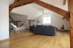 Nous vous proposons un magnifique loft de standing situé à Zillisheim, charmante commune idéalement située entre Mulhouse et Altkirch.

Ce bien de 160 m² au sol (114 m² loi Carrez), entièrement rénové en 2022, se trouve au premier étage d’une petite copropriété dans un environnement bucolique (proximité immédiate du canal, de la nature à moins de 5 minutes à pied).

Caractéristiques du bien :

- Une très grande pièce de vie baignée de lumière, avec cuisine ouverte entièrement équipée (plaques vitrocéramiques, four, lave-vaisselle…), 
- 4 Chambres, 
- Salle de bains avec baignoire et douche, 
- Buanderie. 

Chauffage individuel gaz, Fenêtres double vitrage PVC 

- Une Cave est également comprise avec l'appartement. 

Le loft offre une vue imprenable sur la place de Zillisheim et se situe à moins d’une minute à pied de tous les commerces du centre : boulangerie, pharmacie, tabac, supérette… L’école et le collège sont également à proximité immédiate, accessibles à pied ou à vélo le long du charmant canal. 

Informations complémentaires :
Taxe foncière : 918 €

Charges mensuelles faibles : 50 €

Idéal pour un couple, une famille ou pour un investisseur (loyer estimé à 1000€/mois en location annuelle ; actuellement exploité en gîte avec forte rentabilité).
