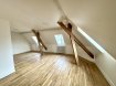 Quartier Impérial Appartement 5 pièces 6ème étage ascenseur .  Appartement à vendre de 5 pièces - 144 m2 - Quartier Impérial 
 Rare ! à 2 pas de la place du Roi George, à 3 min à pied de la gare de Metz (à 330 m), offrez-vous le dernier étage de cet immeuble années 1930, au calme, seul sur votre palier, avec la luminosité rêvée !
 Amateur de belles vues sur la ville, de vraie tranquillité, ce T5 un brin mansardé sans aucun vis-à-vis vous séduira d'emblée, avec son parquet en chêne d'origine dans toutes les pièces de vie, dont un grand salon-séjour en L avec ses poutres de soutènement apparentes lui conférant un cachet singulier et inimitable.
 Intégralement rénové à l'été 2026, accessible par un large ascenseur desservant jusqu'au 5ème étage, un escalier vous amène à pied au 6ème. Un couloir en terrazzo distribue toutes les pièces de vie, la cuisine, deux chambres et la salle de bain ainsi que l'escalier conduisant au 7ème et débouchant, après le pallier où peut être aménagé un bureau, 2 chambres, créant ainsi un second niveau, avec, en sus, de nombreuses possibilités de rangement dans les sous-pentes.
 Cet appartement offre des prestations de belle facture ; une grande cuisine équipée neuve implantée dans un bel espace bénéficiant d'une exposition à l'est, permet de cuisiner et de recevoir en toute convivialité. Au bout du couloir, une salle de bains neuve conçue avec sa double-vasque, sa baignoire et sa douche spacieuse, son WC, et son espace pour votre lave(sèche)-linge.
 Toutes les fenêtres sont neuves et autorisées par les ABF. L'orientation Ouest/Sud-ouest du grand salon-séjour favorise la lumière, offrant en permanence une clarté appréciable, ainsi qu'une vue très dégagée et sans aucun vis-à-vis, au-dessus des toits (INSEE). Possibilité de réaliser une climatisation.
 DPE D. Charges mensuelles : 150 euros par mois. Chaudière individuelle au gaz. Taxe foncière annuelle 1150 EUR (2026).